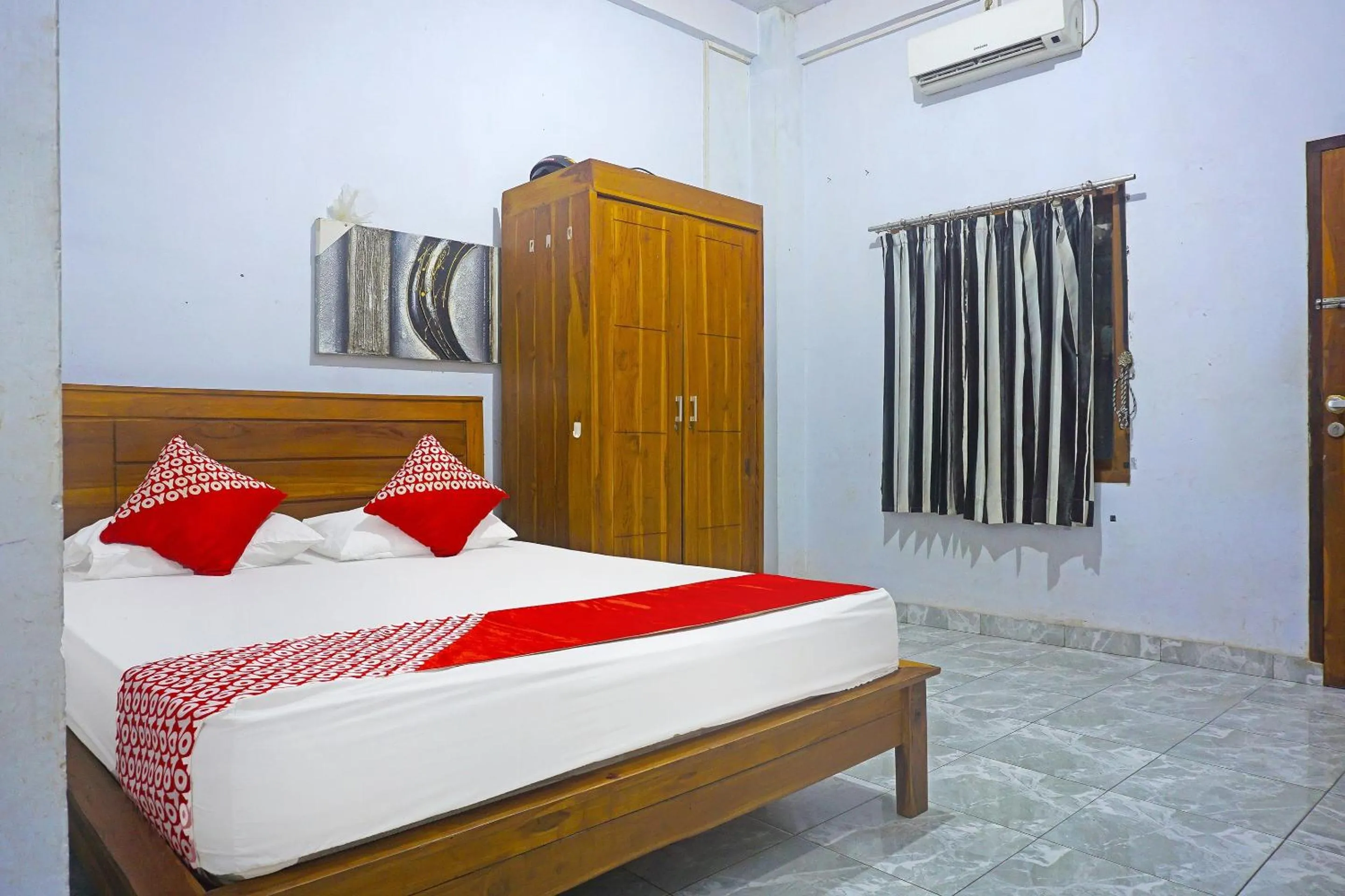 Bedroom, Bed in Hotel O Anggrek Homes Makassar
