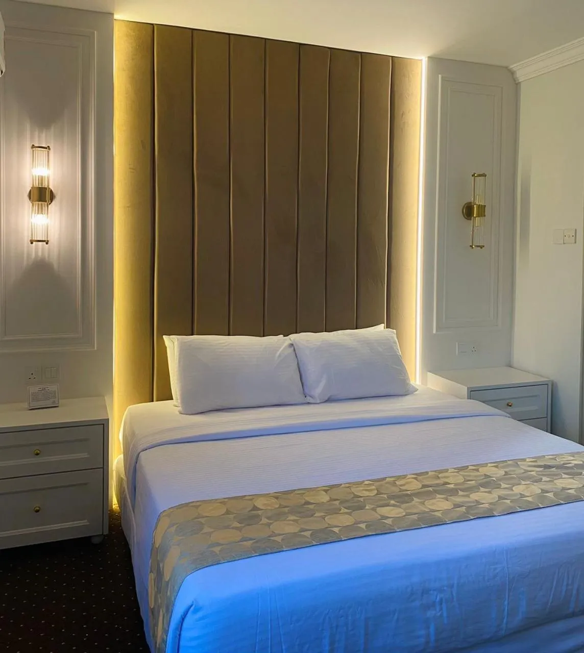 Bed in SWISS AVENUE HOTEL