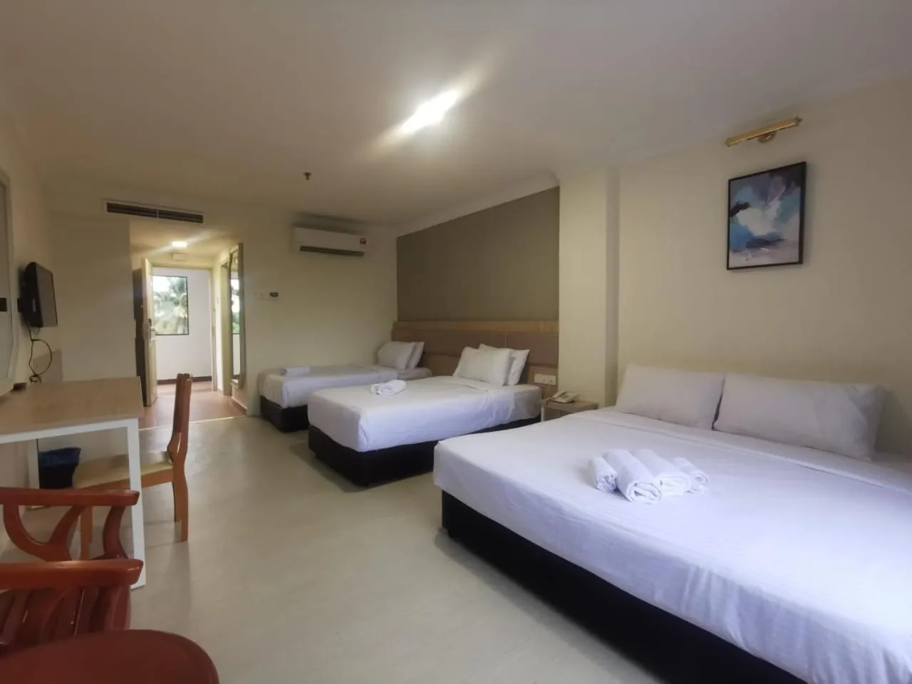 Bed in SWISS AVENUE HOTEL