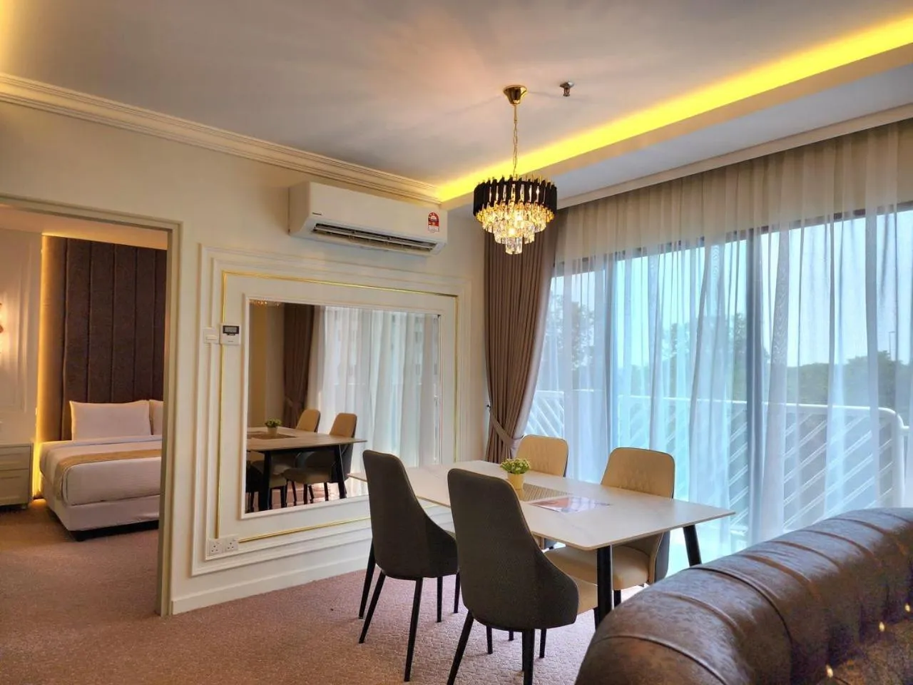 Bed in SWISS AVENUE HOTEL