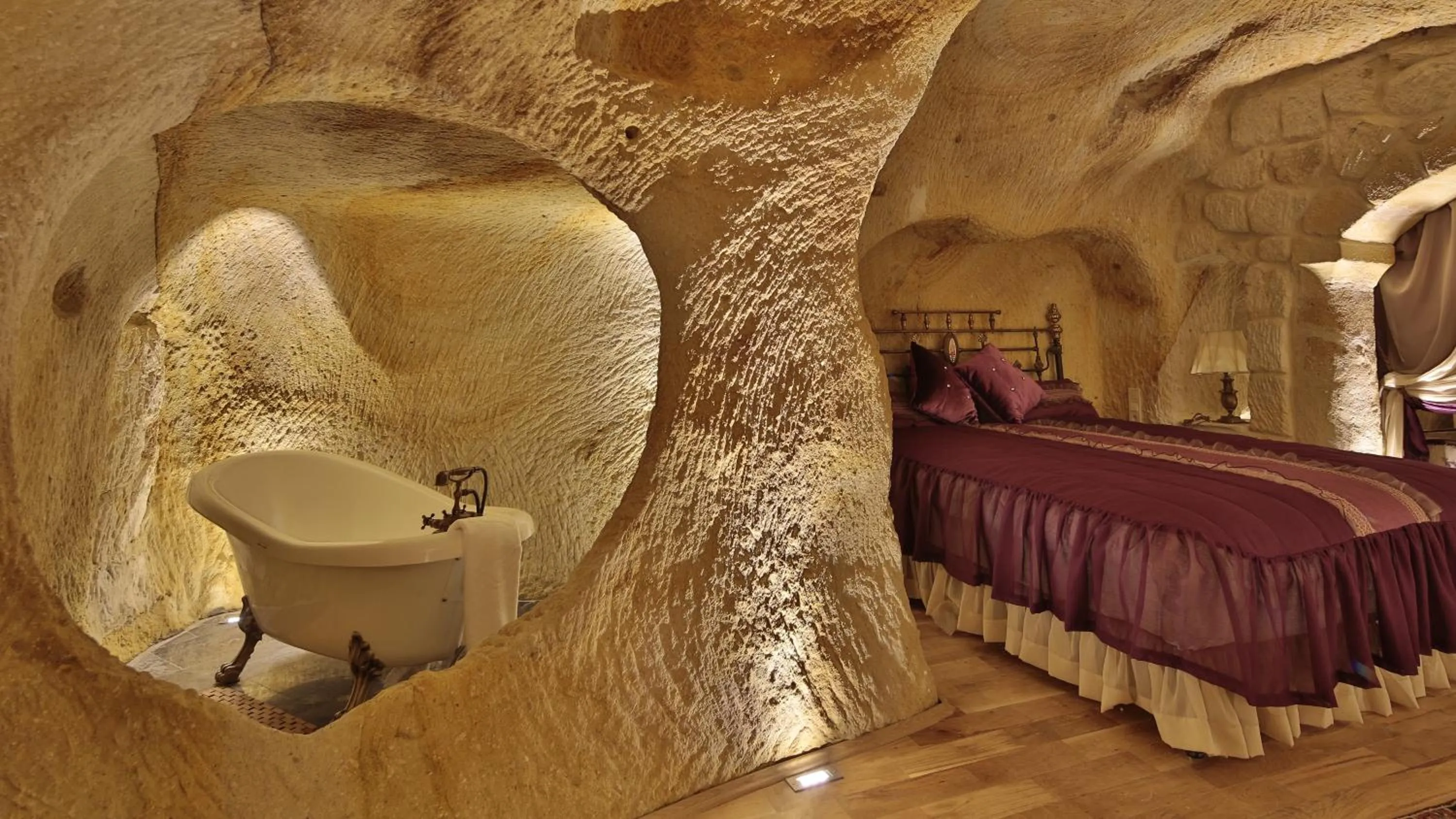 Photo of the whole room, Bed in Golden Cave Suites