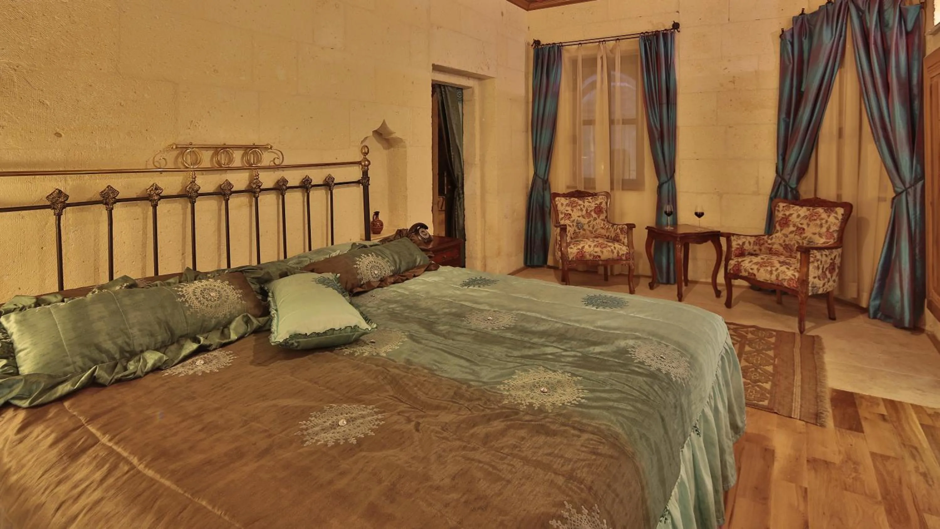 Bed in Golden Cave Suites