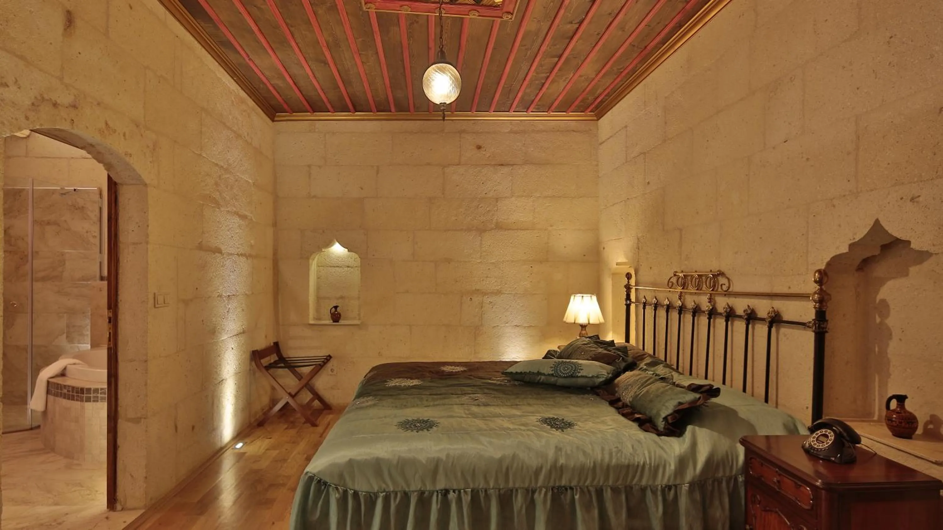 Bed in Golden Cave Suites