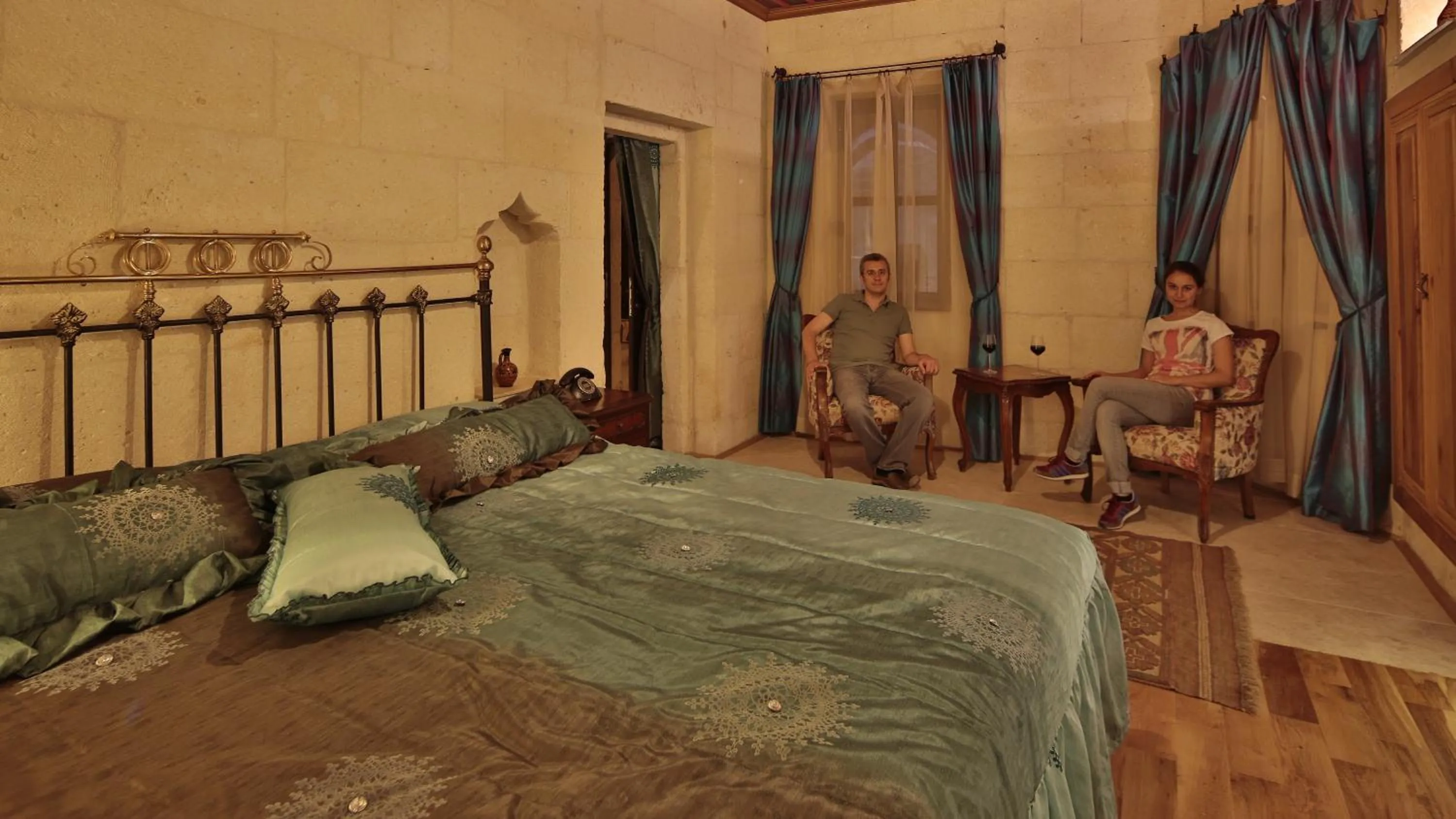 Bed in Golden Cave Suites