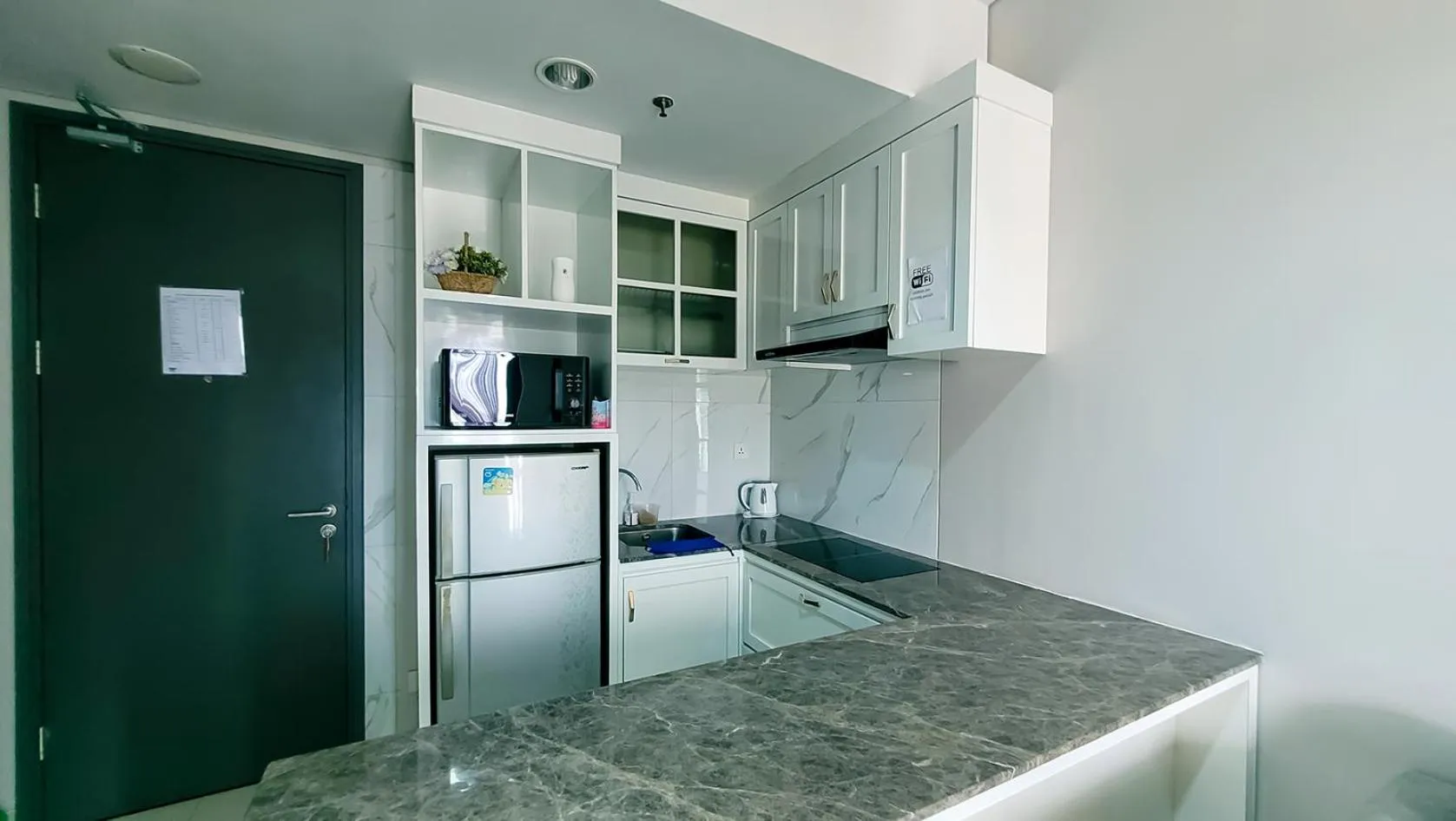 Kitchen or kitchenette in Palam Mansion at Apartment One Residence
