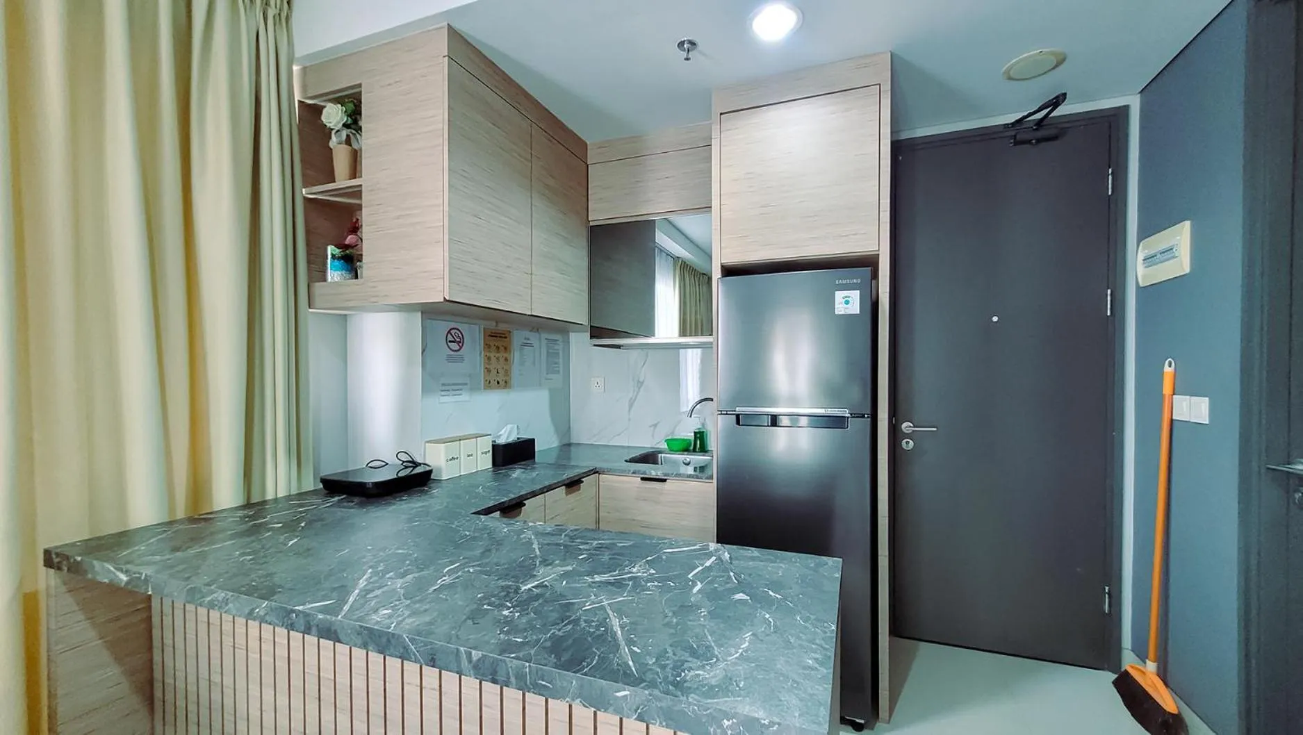 Kitchen or kitchenette in Palam Mansion at Apartment One Residence