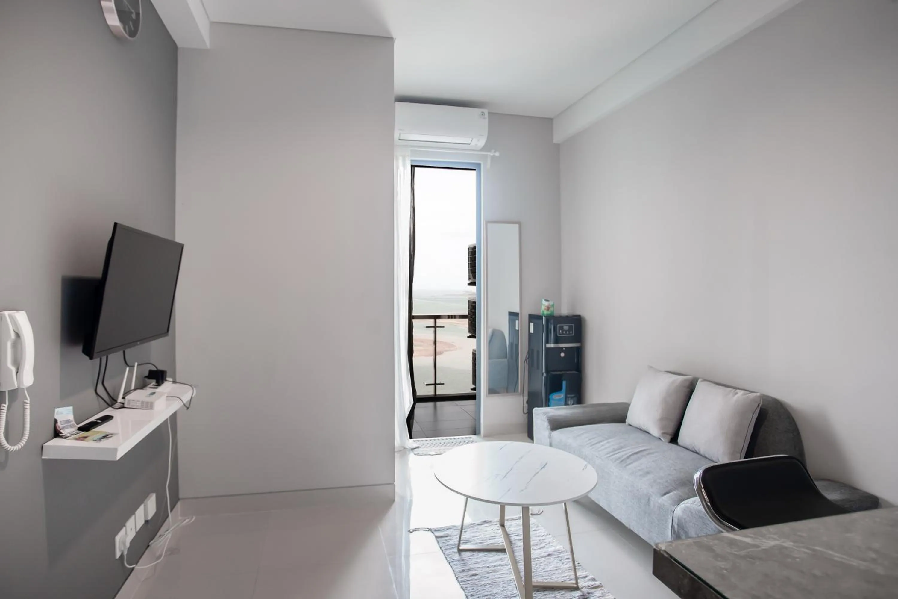 Communal lounge/ TV room, Bed in Palam Mansion at Apartment One Residence