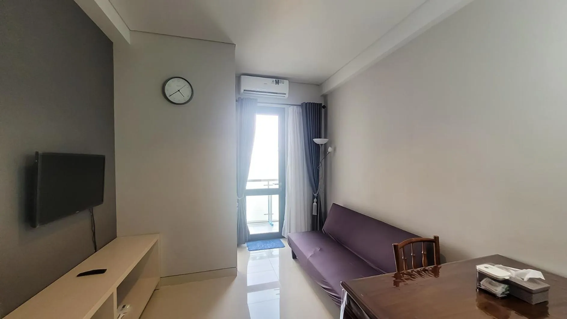 Communal lounge/ TV room in Palam Mansion at Apartment One Residence