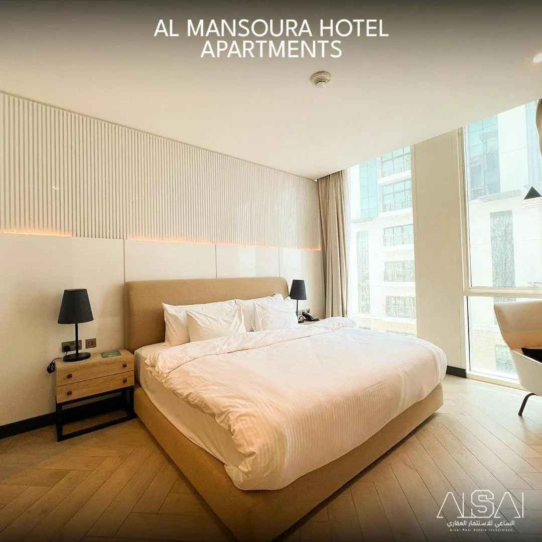 Bed in Royal Mansoura Residence Hotel