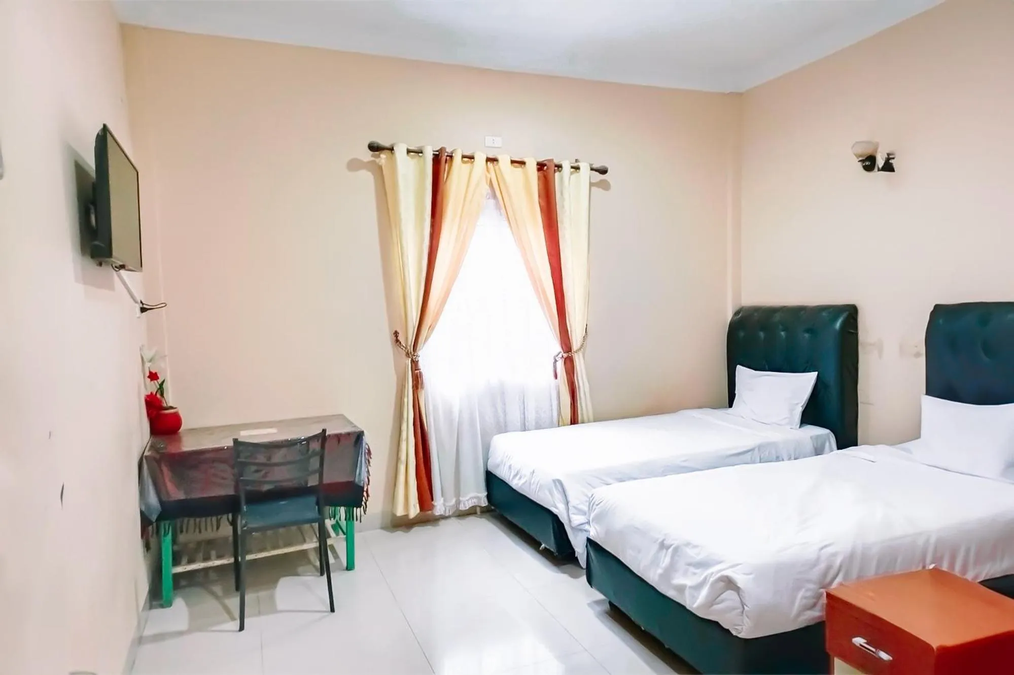 Bed in Hotel New Dieng By Helocus