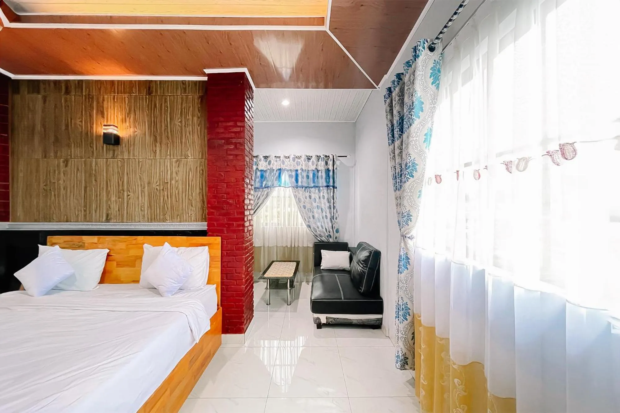 Bed in Hotel New Dieng By Helocus