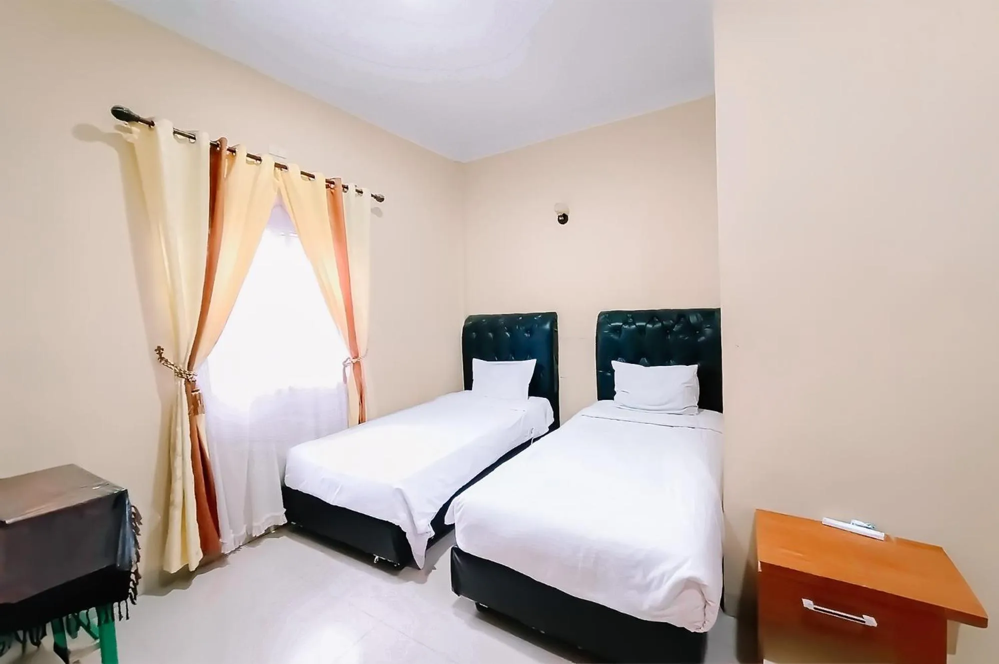 Bed in Hotel New Dieng By Helocus