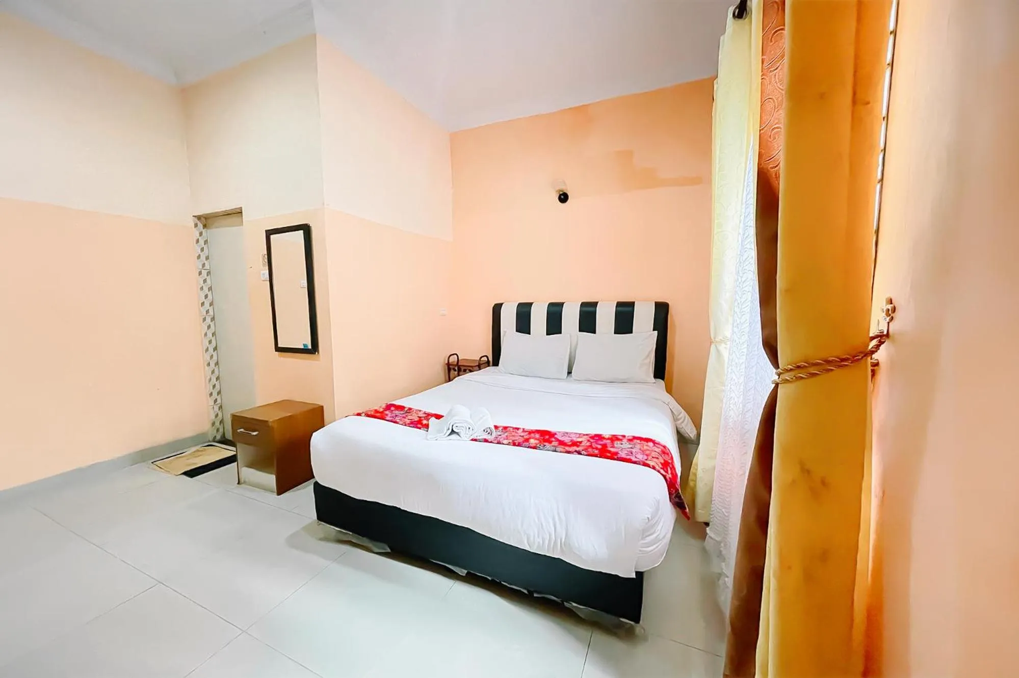 Bed in Hotel New Dieng By Helocus