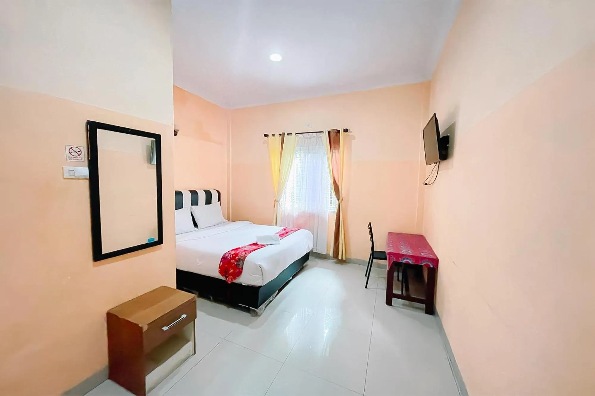 Bed in Hotel New Dieng By Helocus