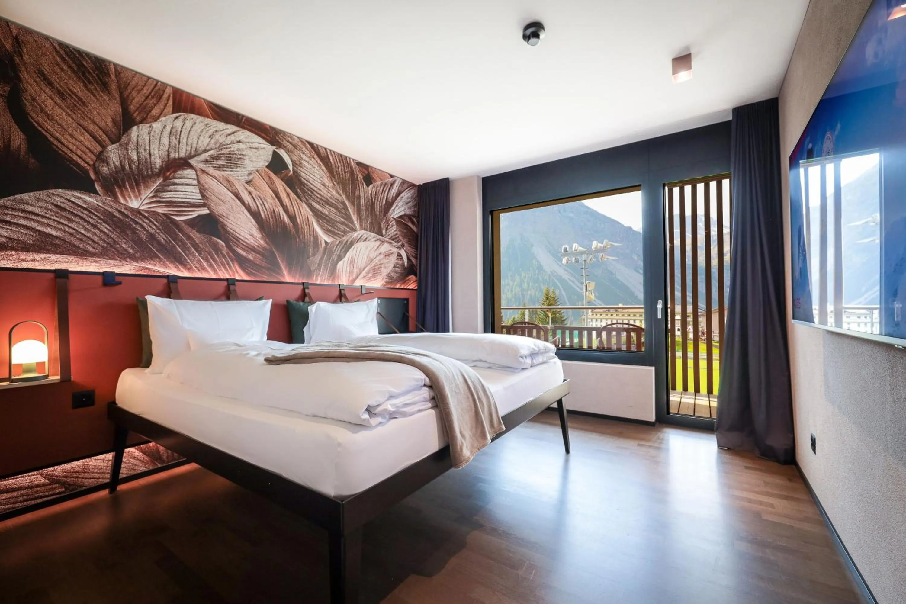 Bed in AVES Hotel&Apartment Arosa