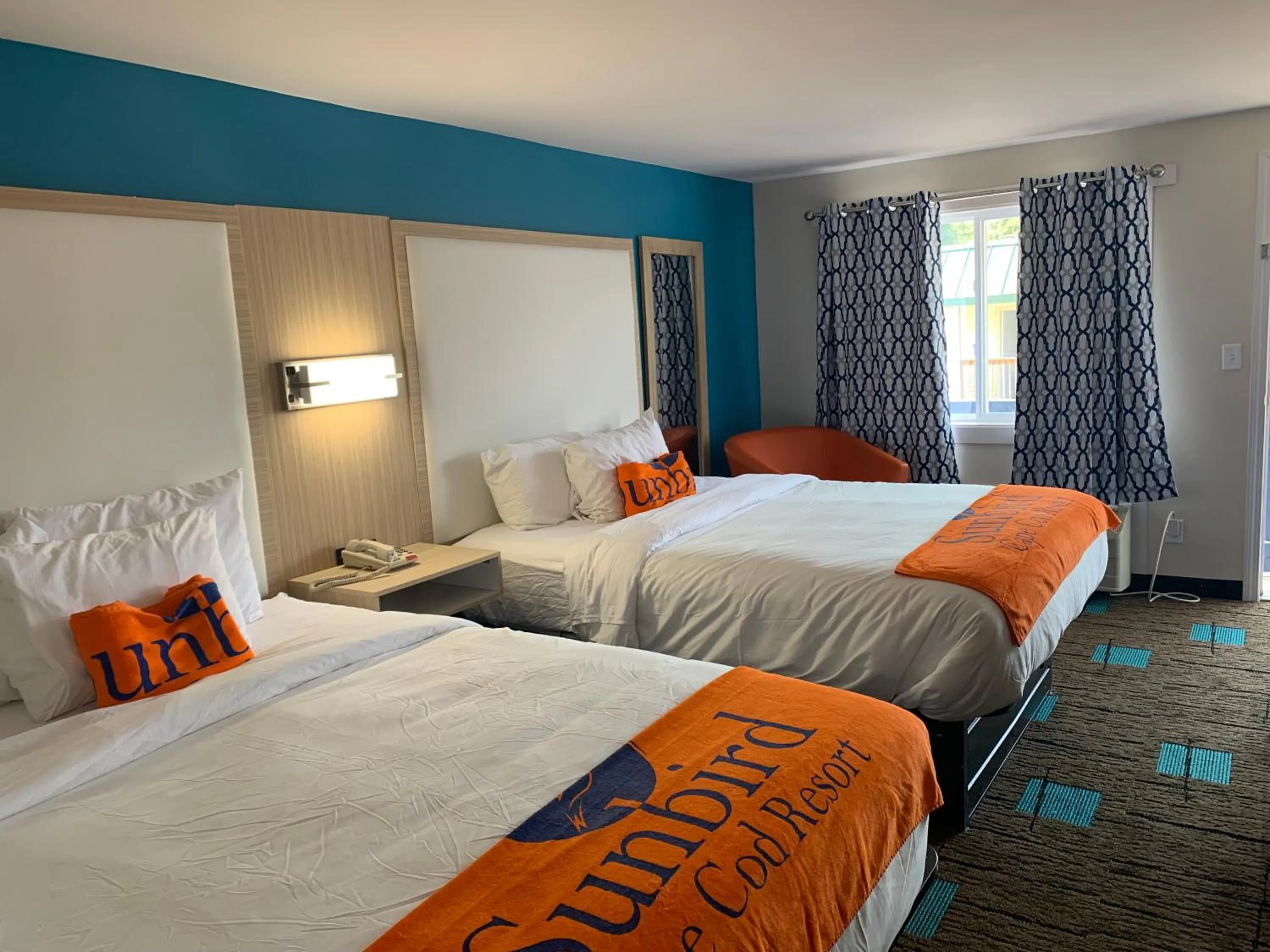 Photo of the whole room, Bed in Sunbird Cape Cod Annex