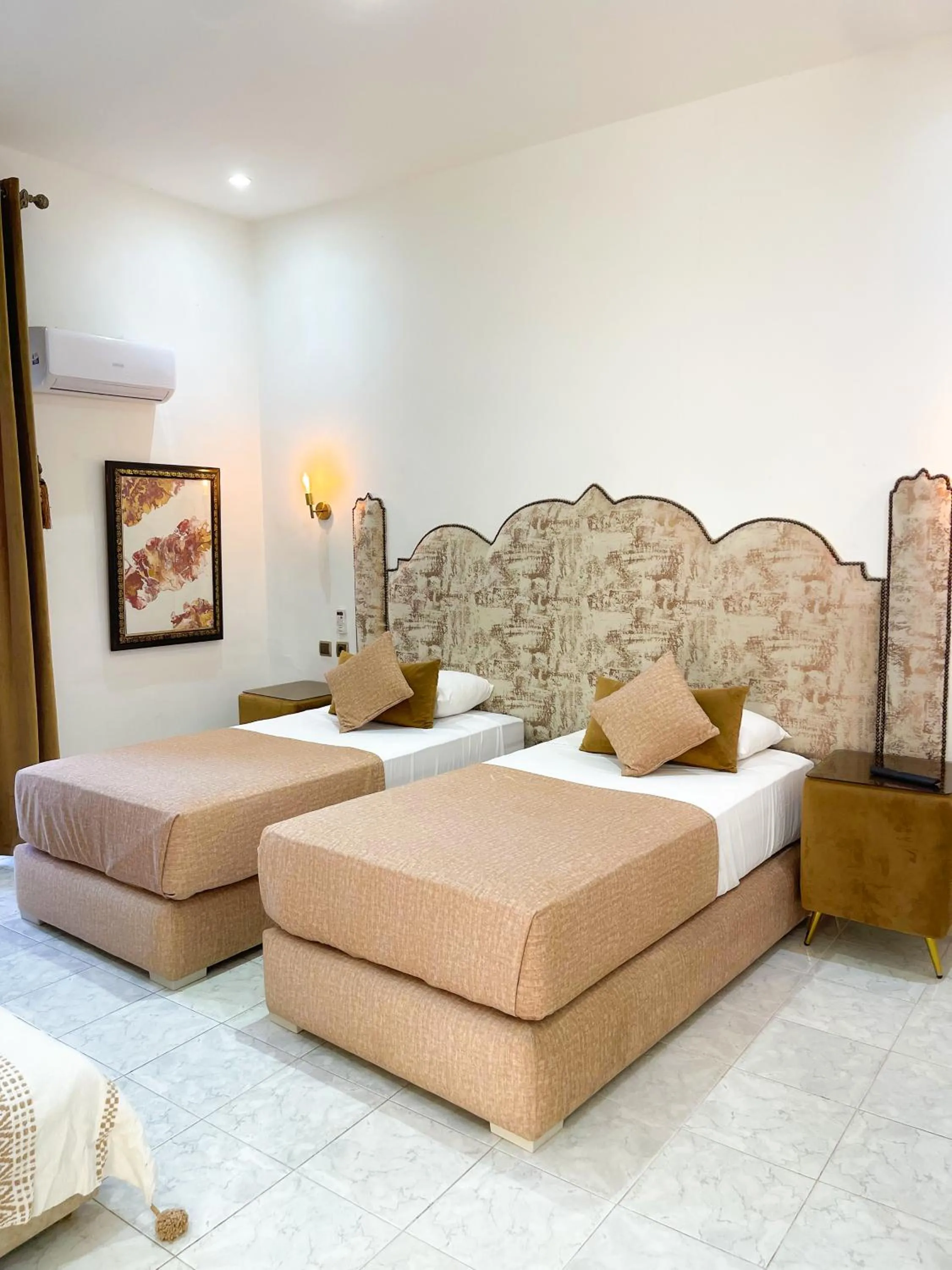 Living room, Bed in Hotel Palace tanger