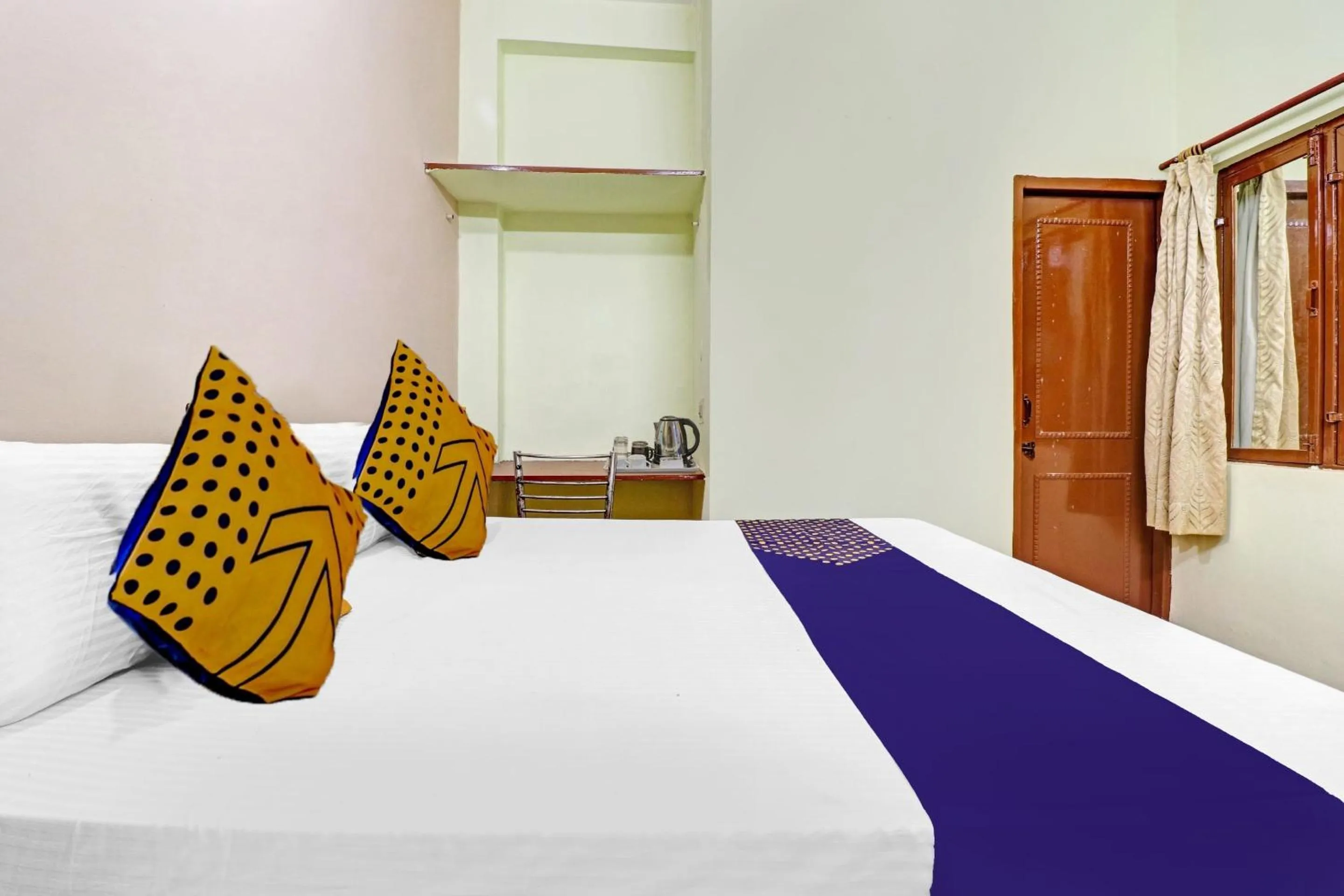 Bedroom, Bed in SPOT ON Ganpati Home Stays