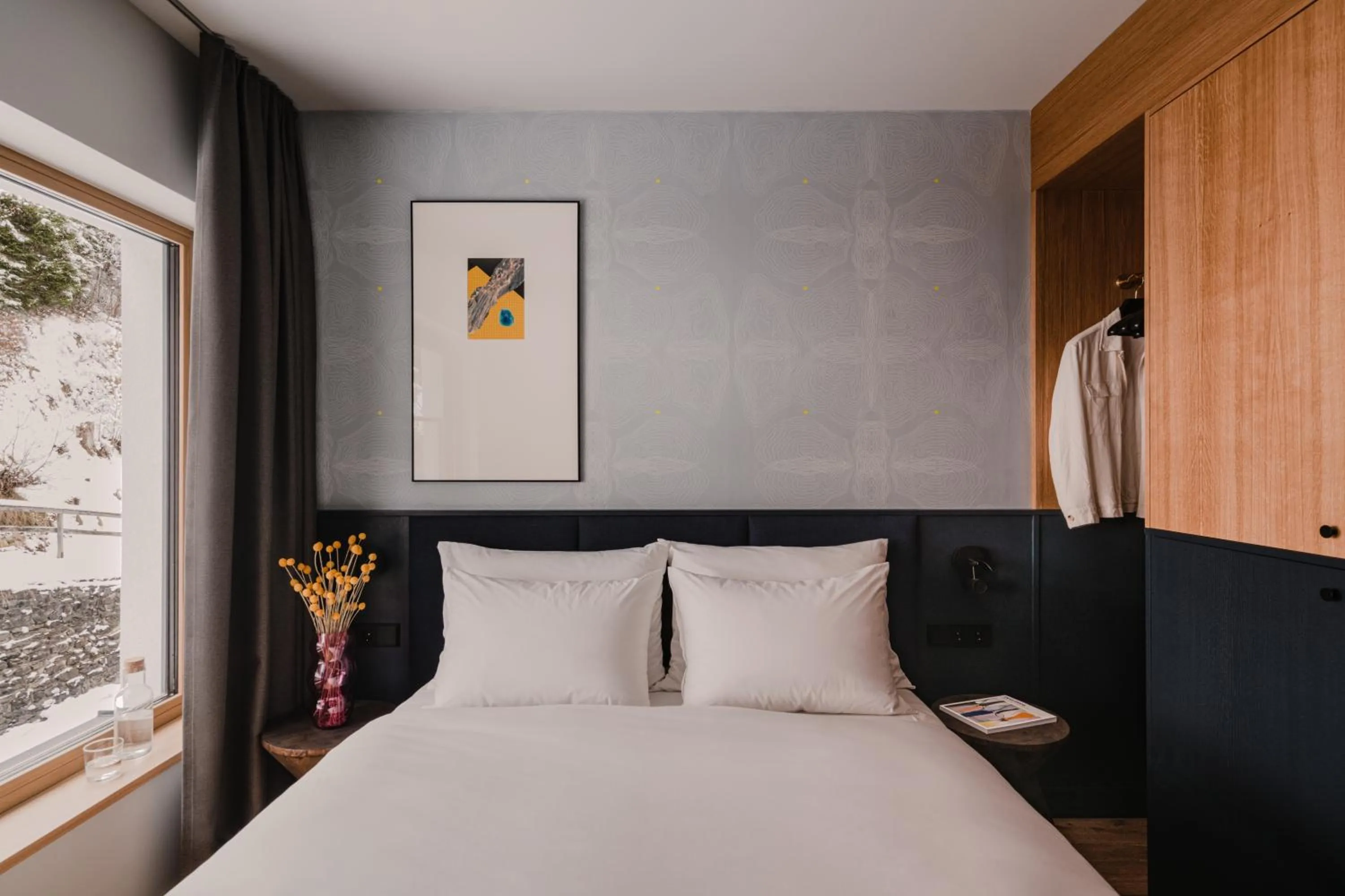 Bed in The Comodo Bad Gastein, a Member of Design Hotels