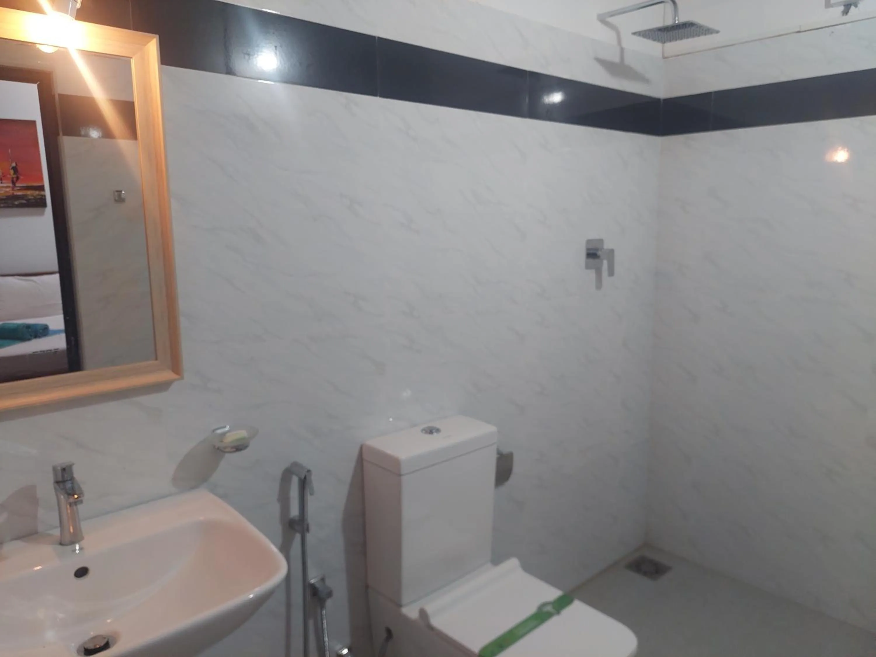 Shower in Green Light Holiday Village