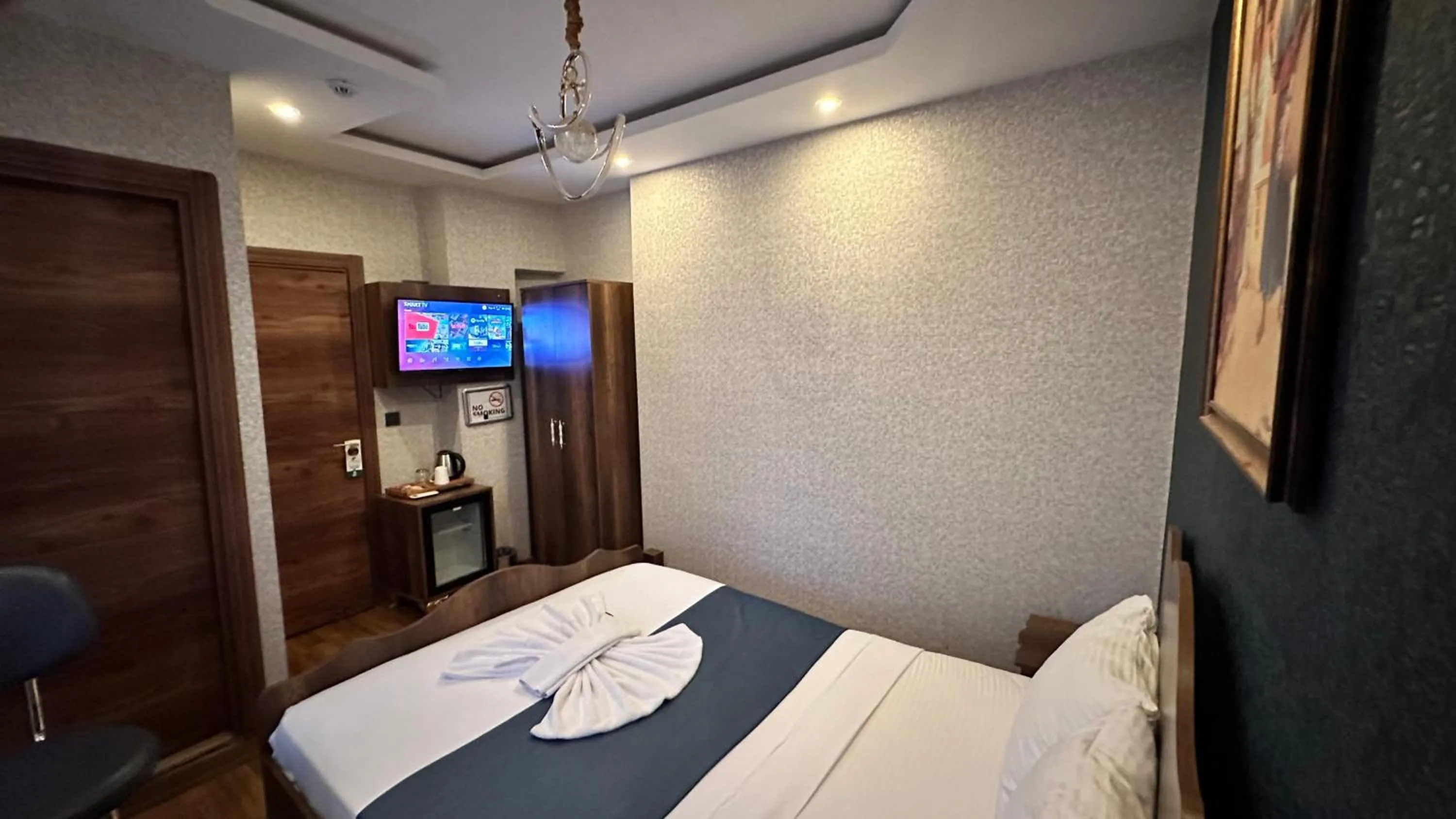 Bed in Aras Boutique Hotel & Suites