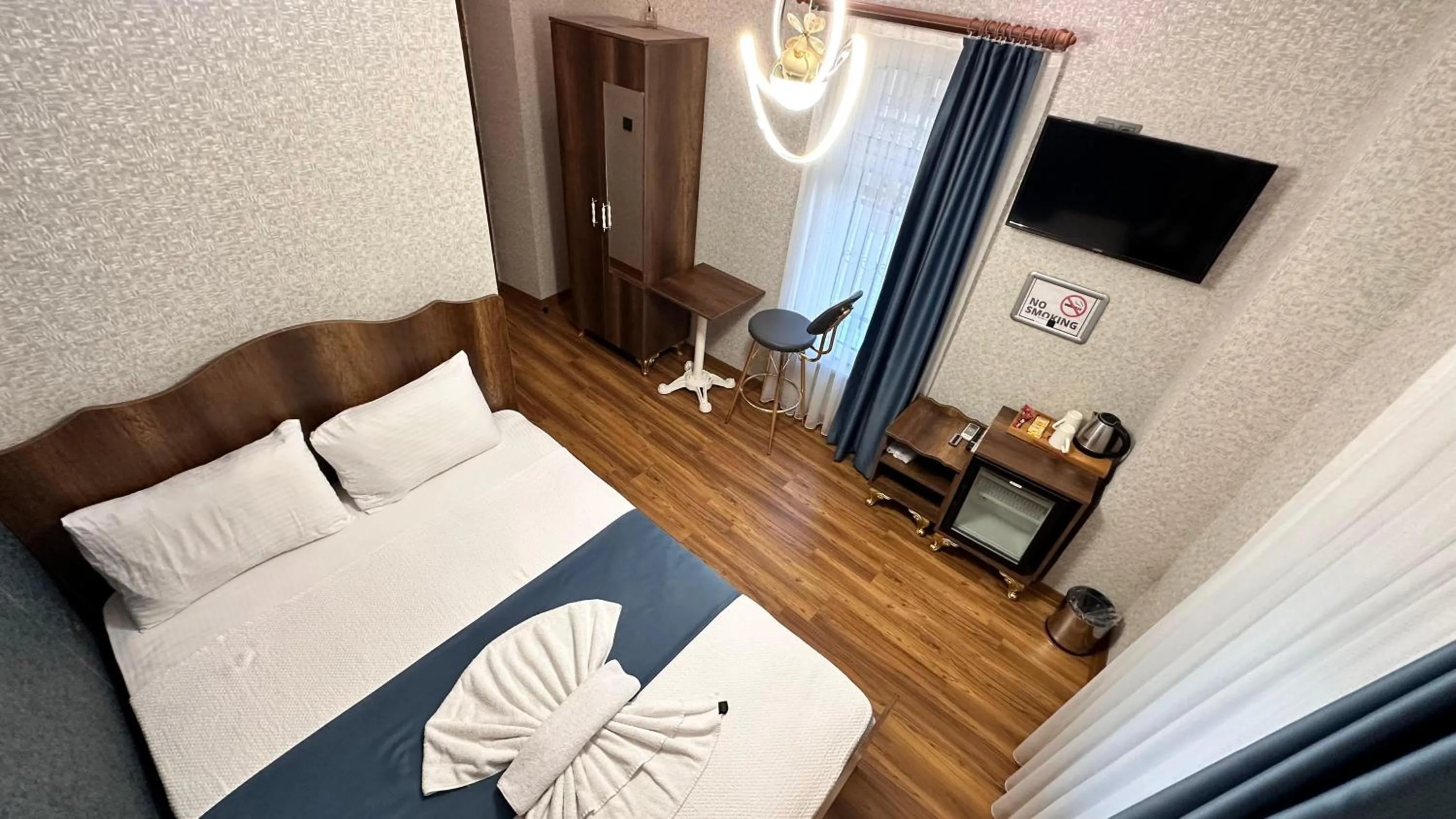 Communal lounge/ TV room, Bed in Aras Boutique Hotel & Suites