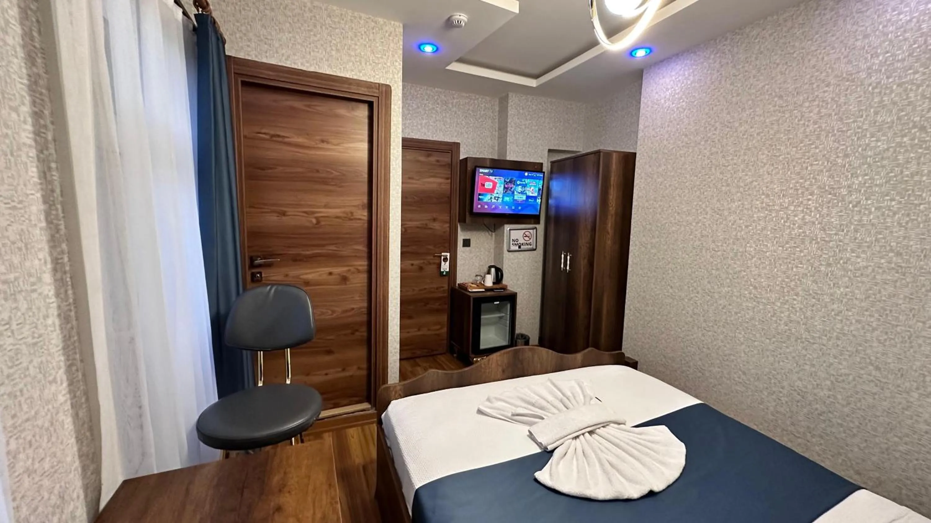 Bed in Aras Boutique Hotel & Suites