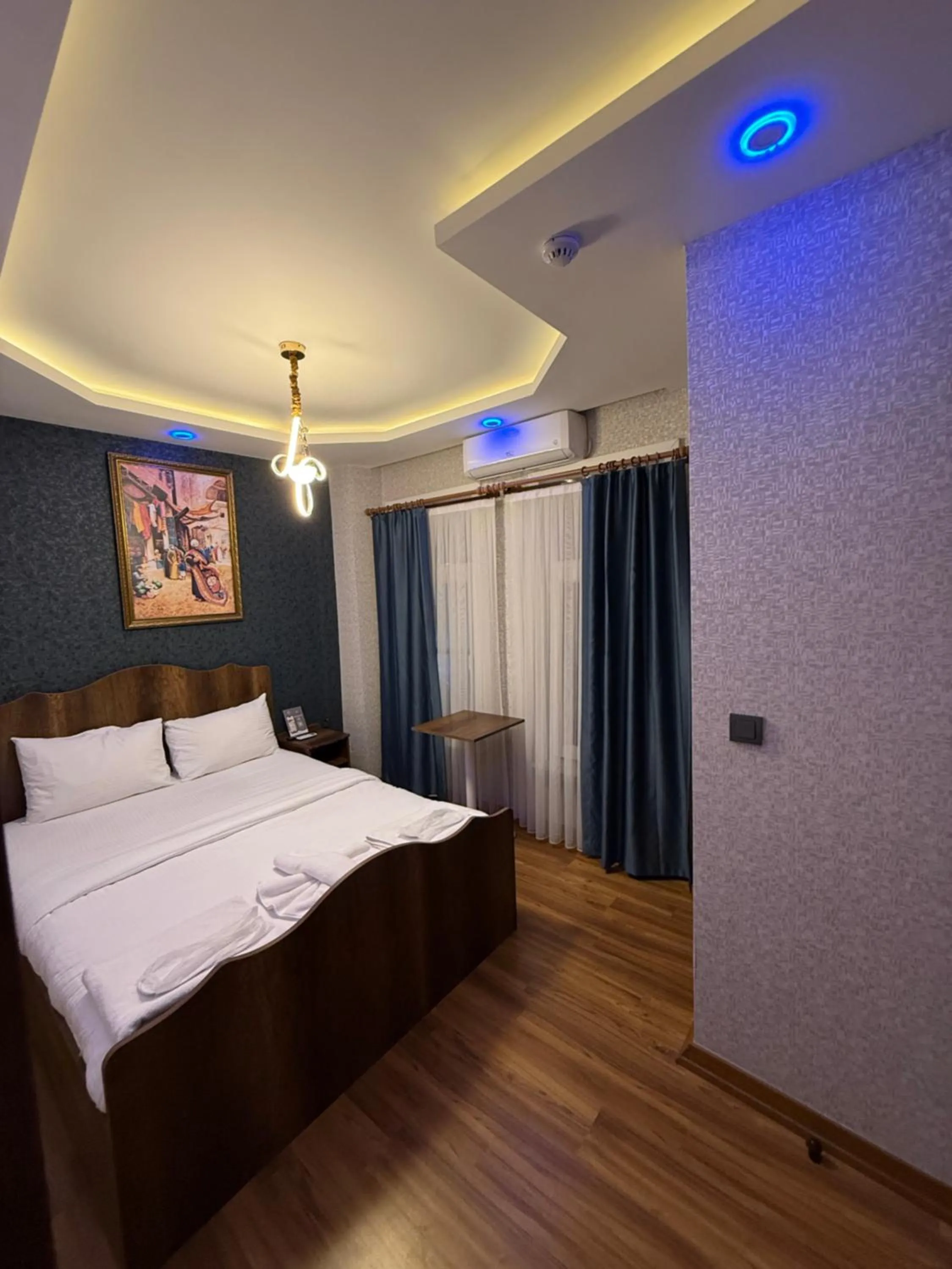 Bed in Aras Boutique Hotel & Suites