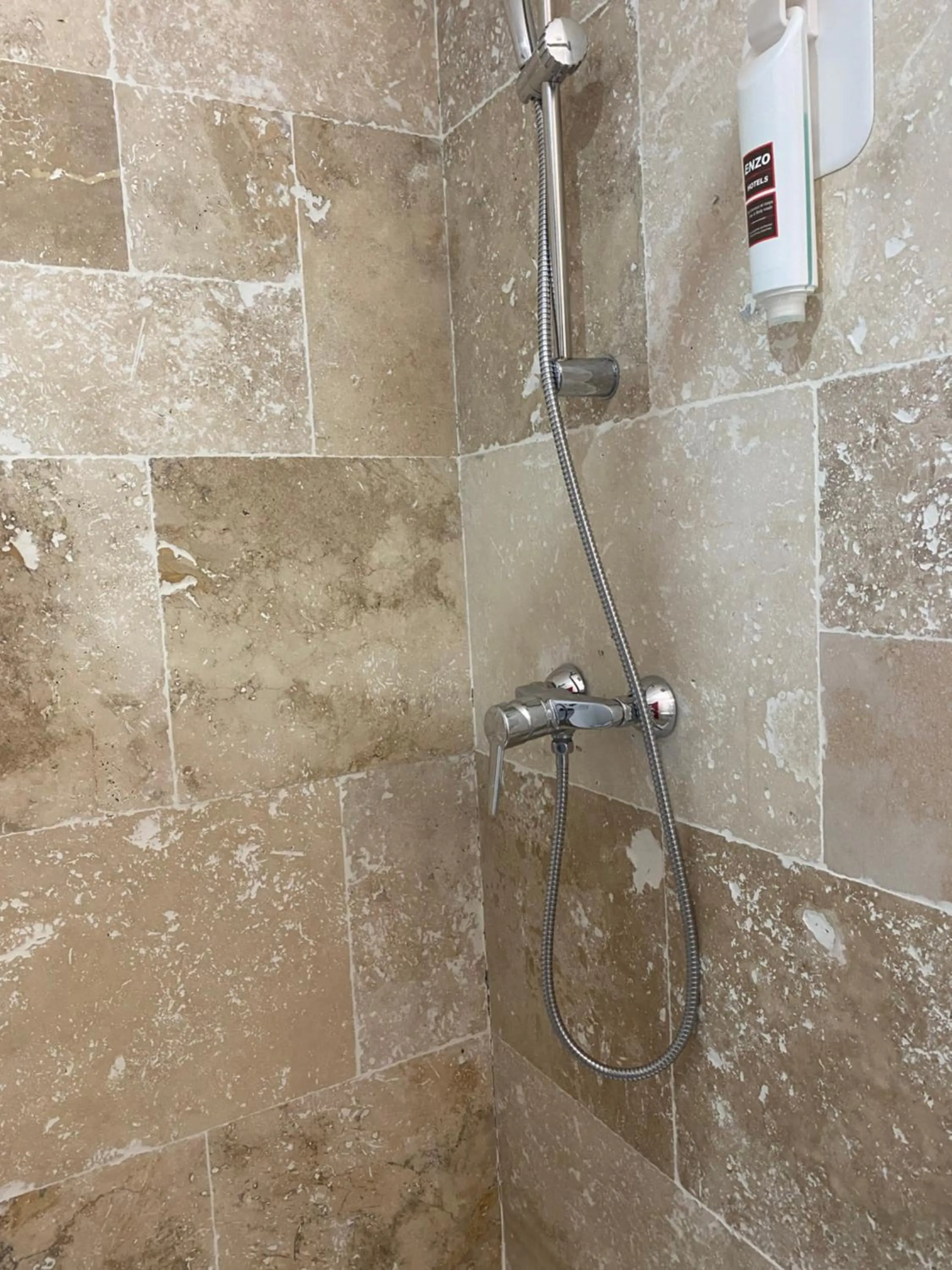 Shower in Enzo Hotels Limoges Centre Jourdan by Kyriad Direct