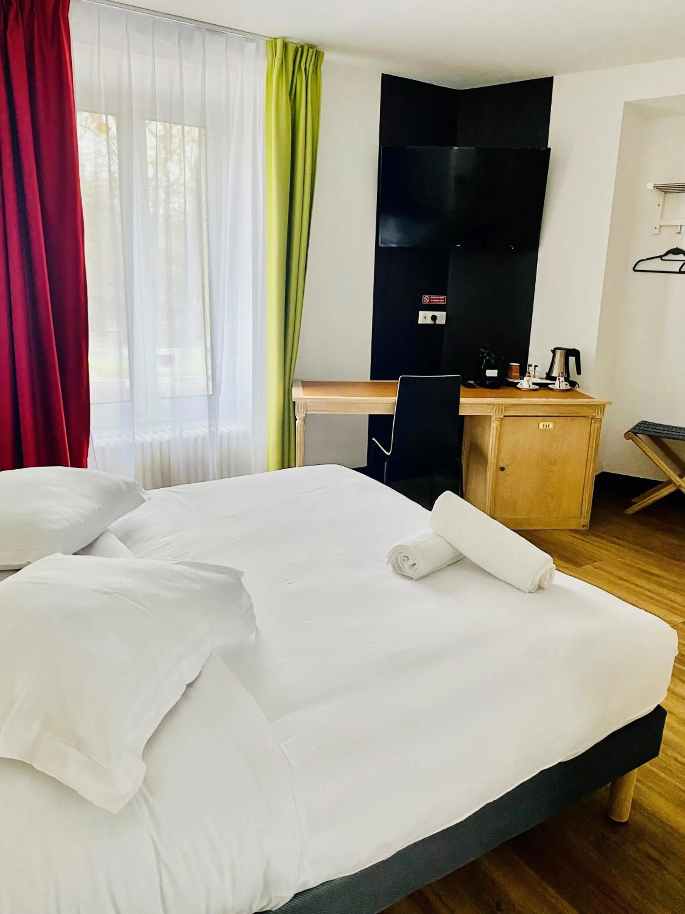 Bedroom in Enzo Hotels Limoges Centre Jourdan by Kyriad Direct