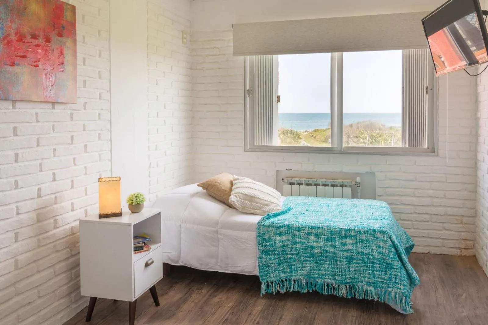 Bed in Portobello Suites Hotel