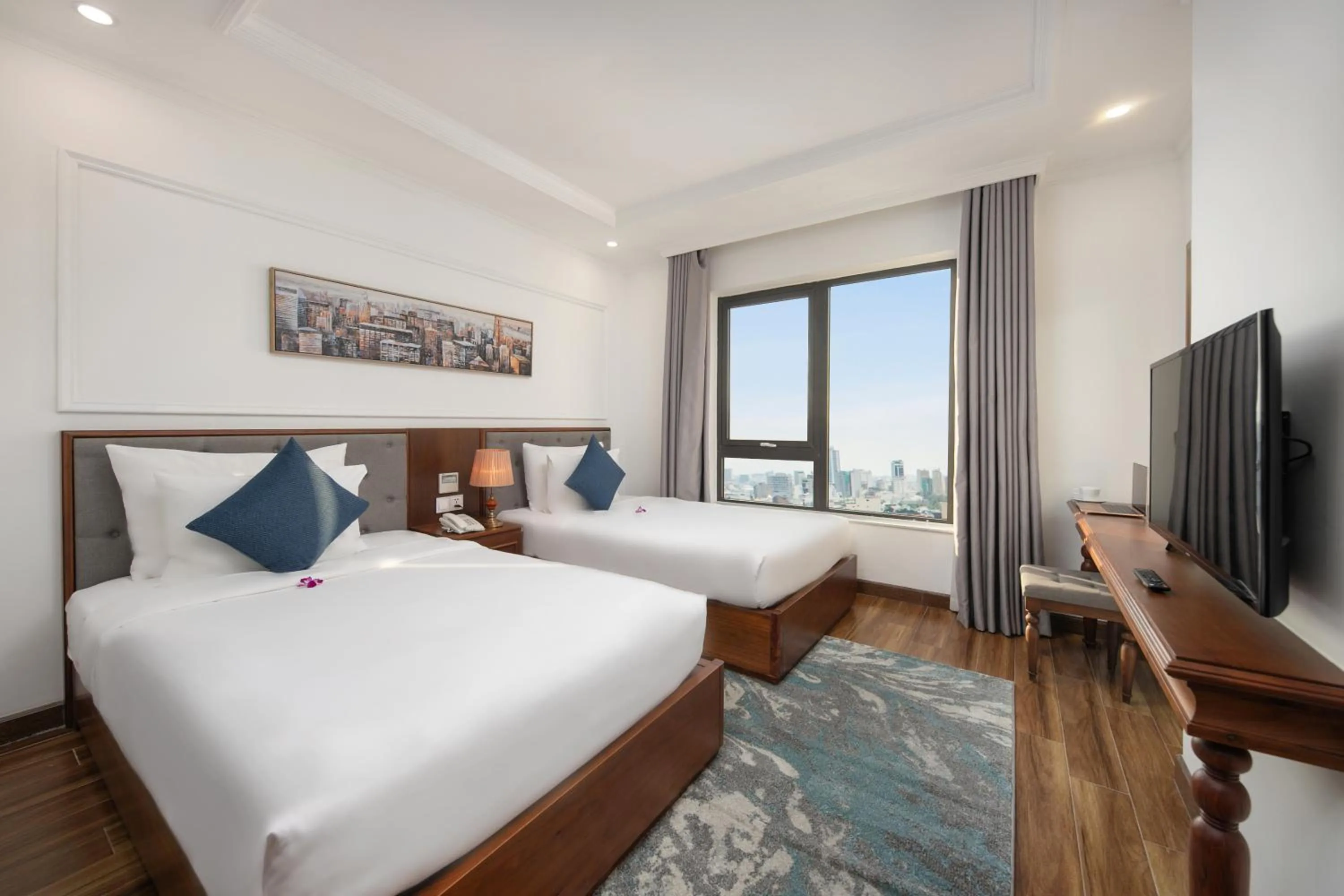 Photo of the whole room, Bed in The Sail Hotel - My Khe Beach