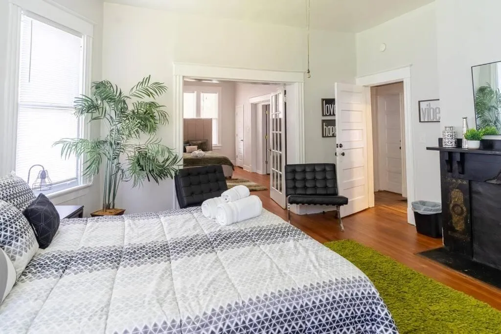 Bed in The Great Pink Lady with Huge Wrap Around Porch!