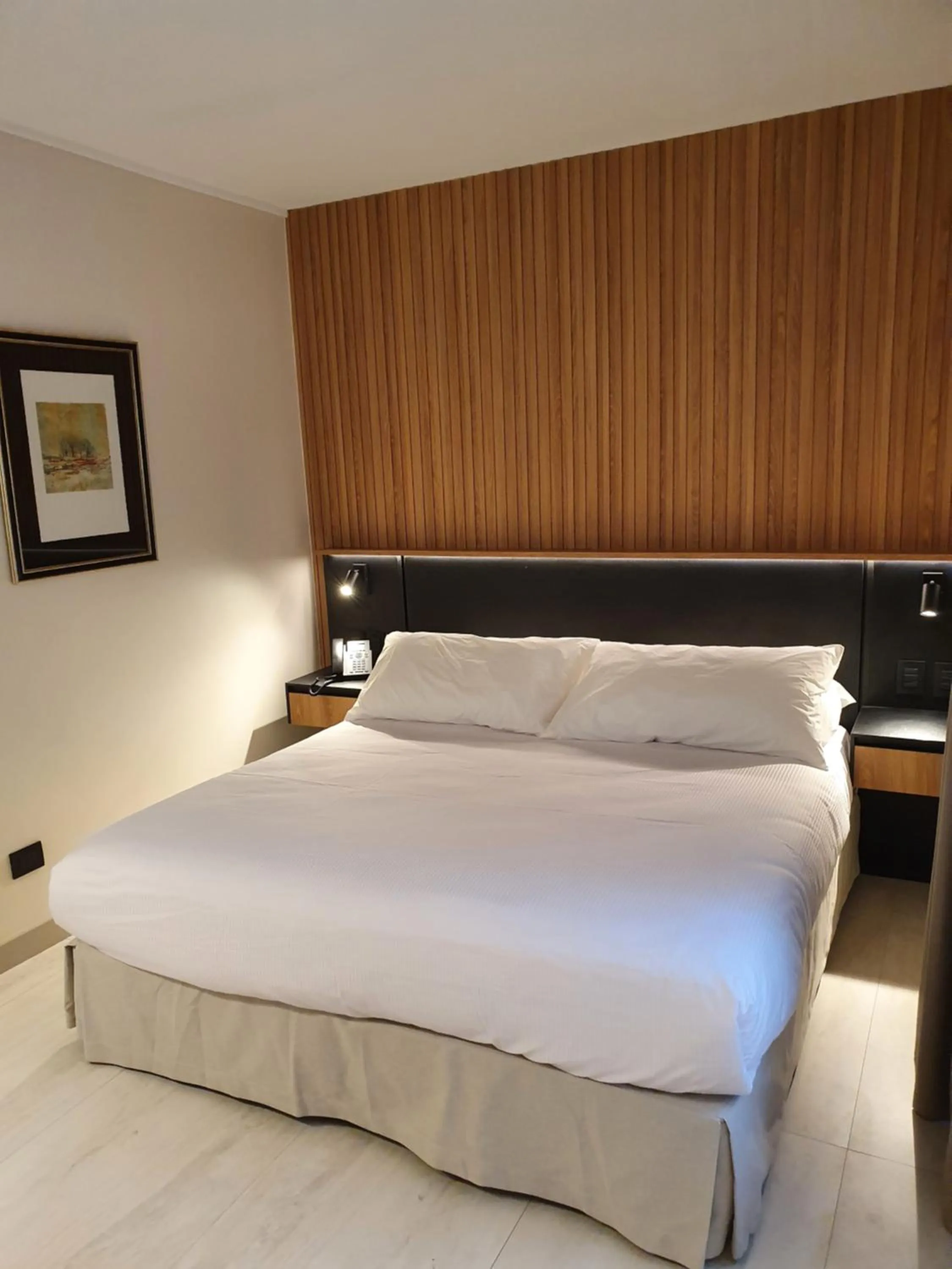 Bed in Lastarria Hotel