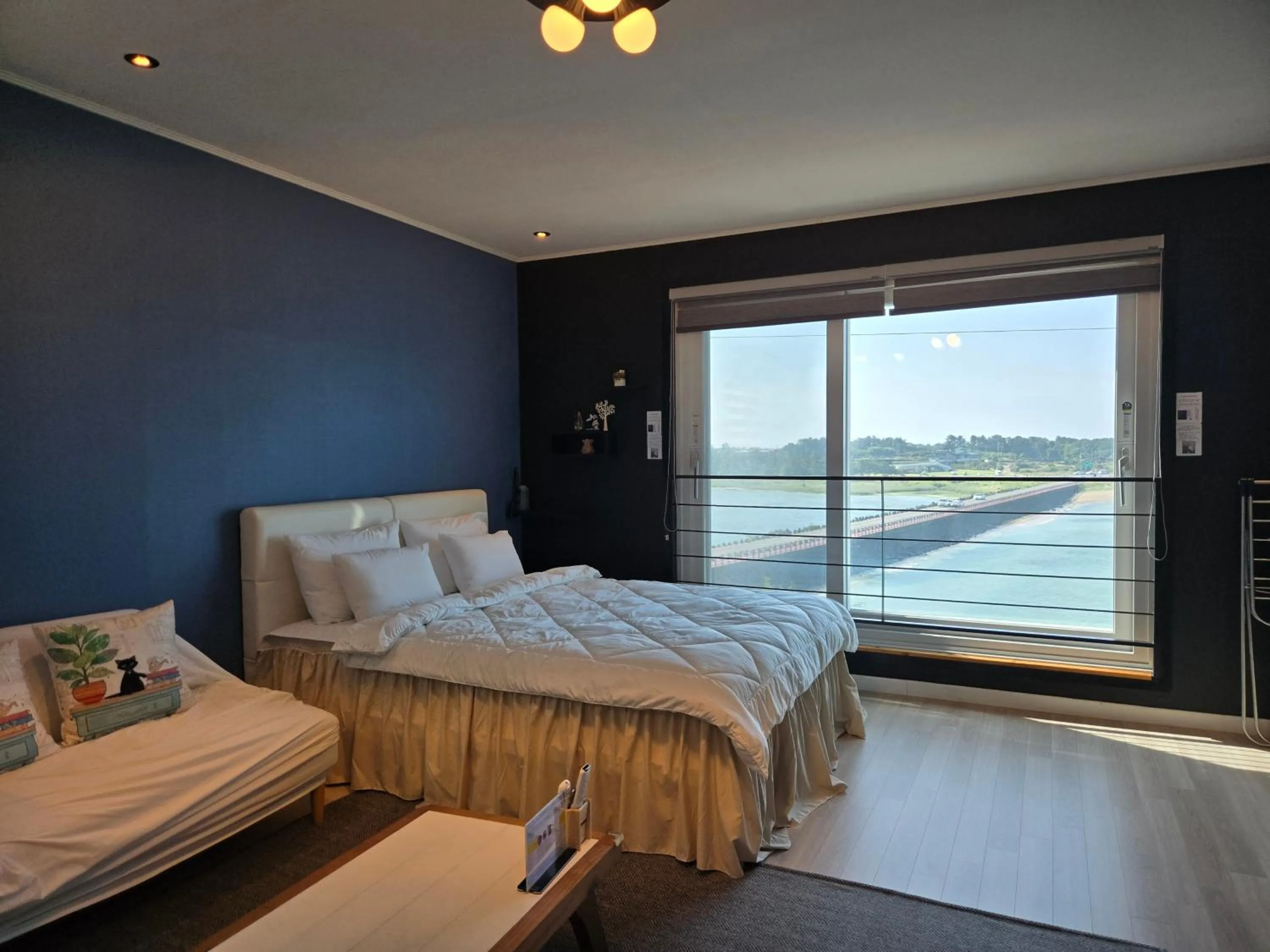 Bed in Jeju Gaviota Pension