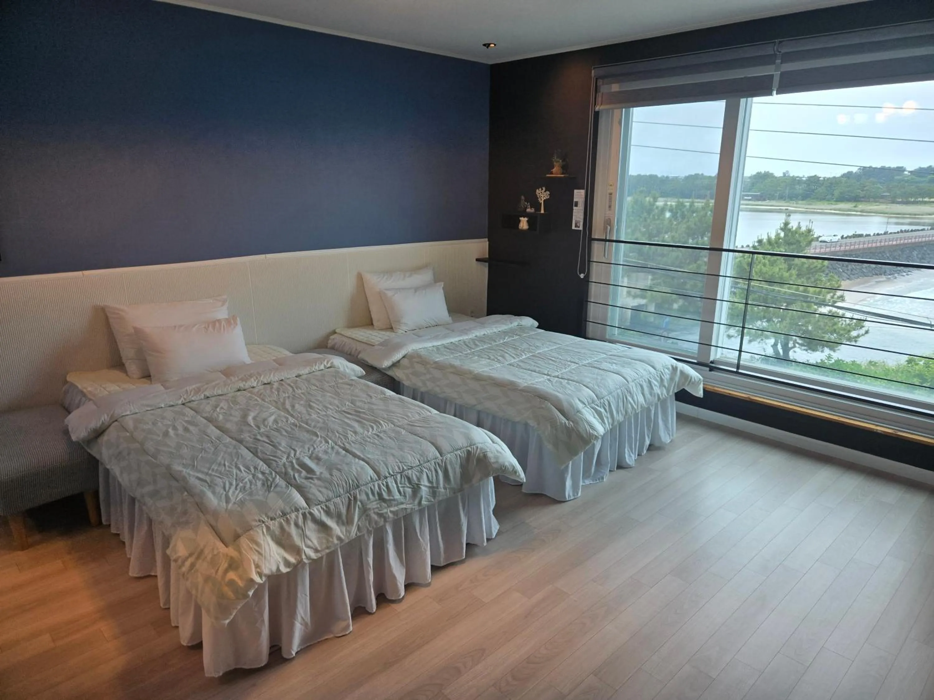 Bed in Jeju Gaviota Pension