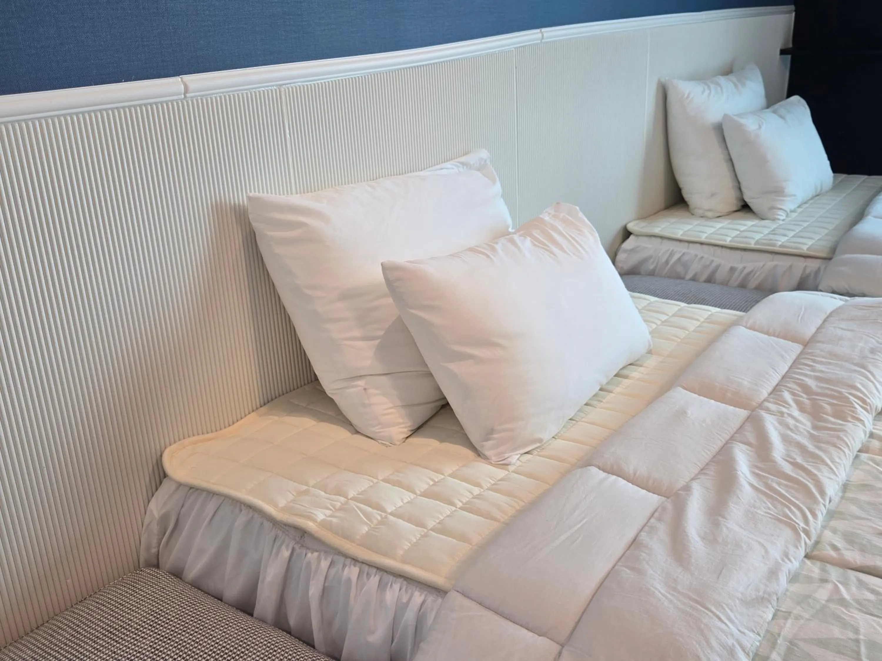 Bed in Jeju Gaviota Pension