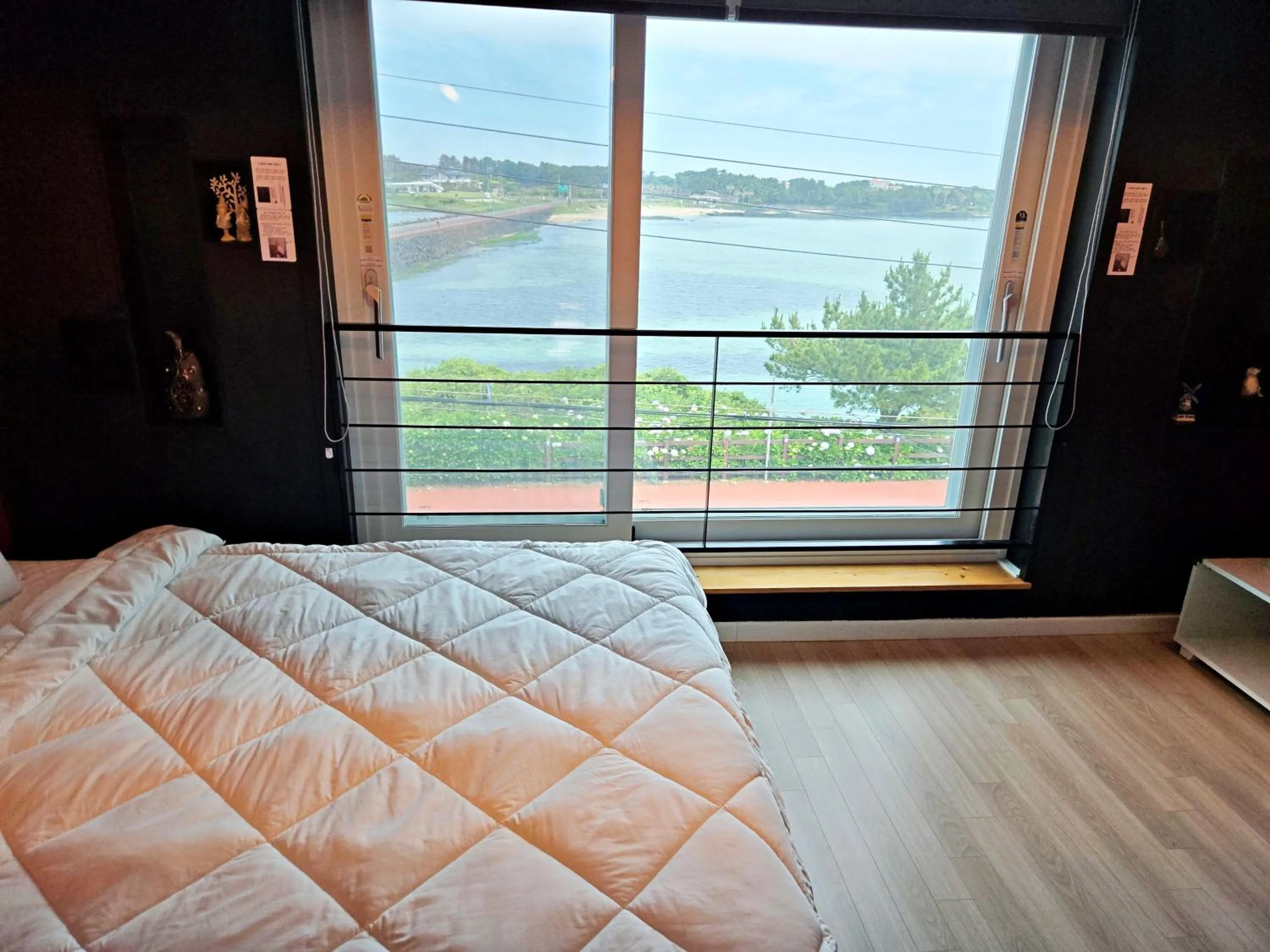 Bed in Jeju Gaviota Pension