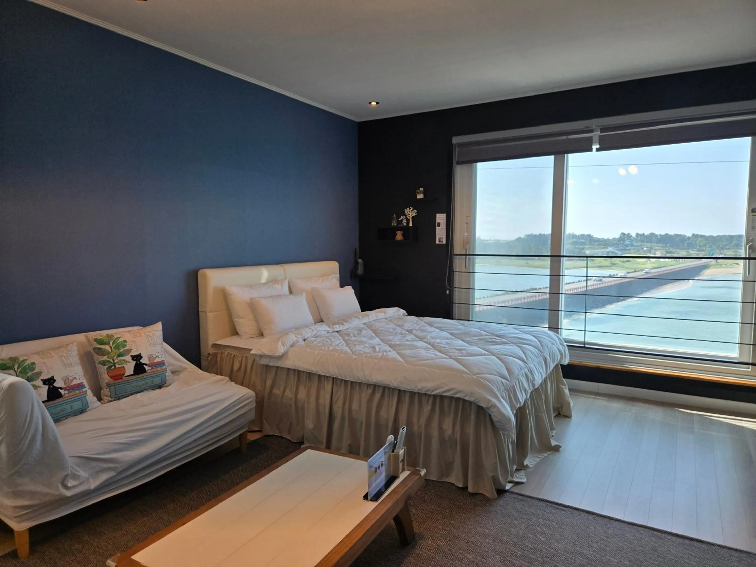 Bed in Jeju Gaviota Pension