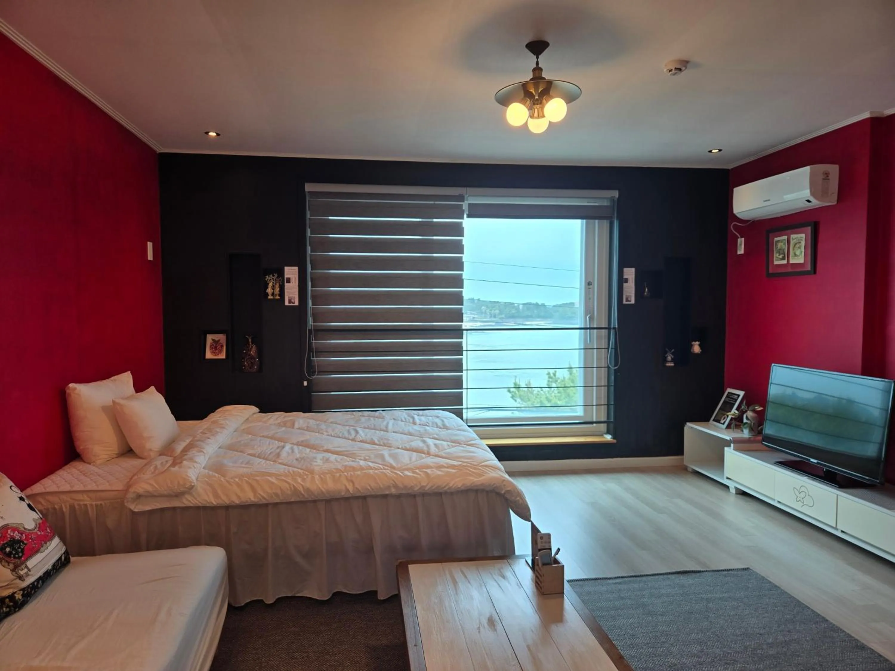 Bed in Jeju Gaviota Pension