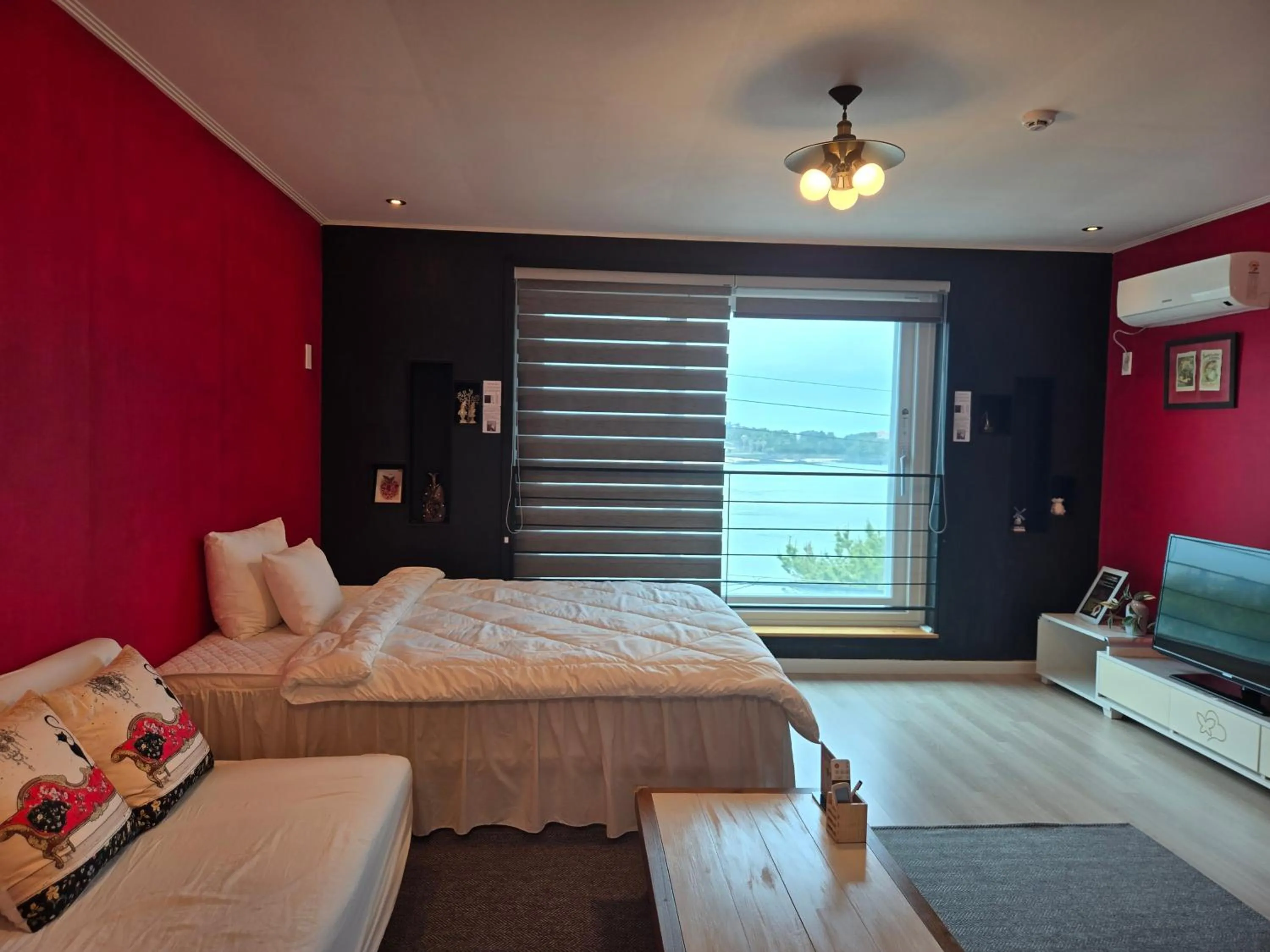 Bed in Jeju Gaviota Pension