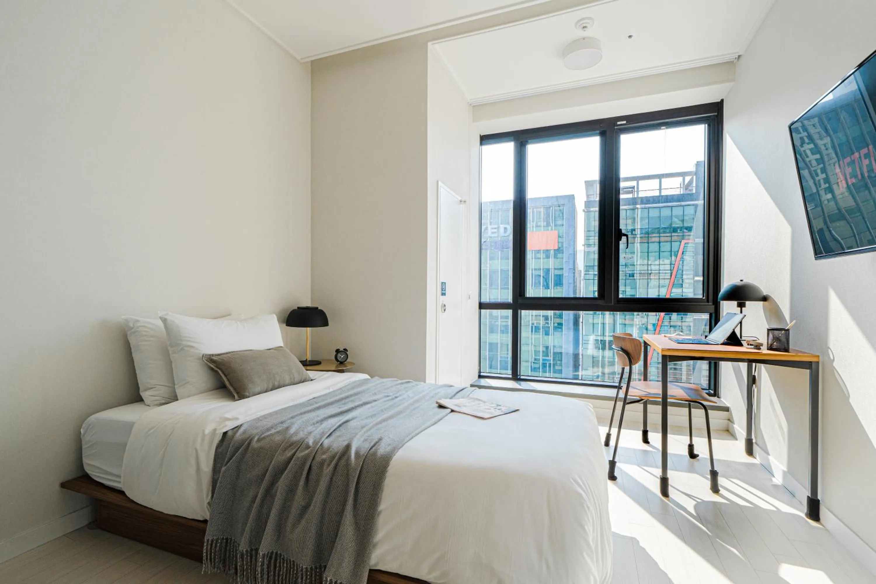 Bed in Urbanstay Seomyeon