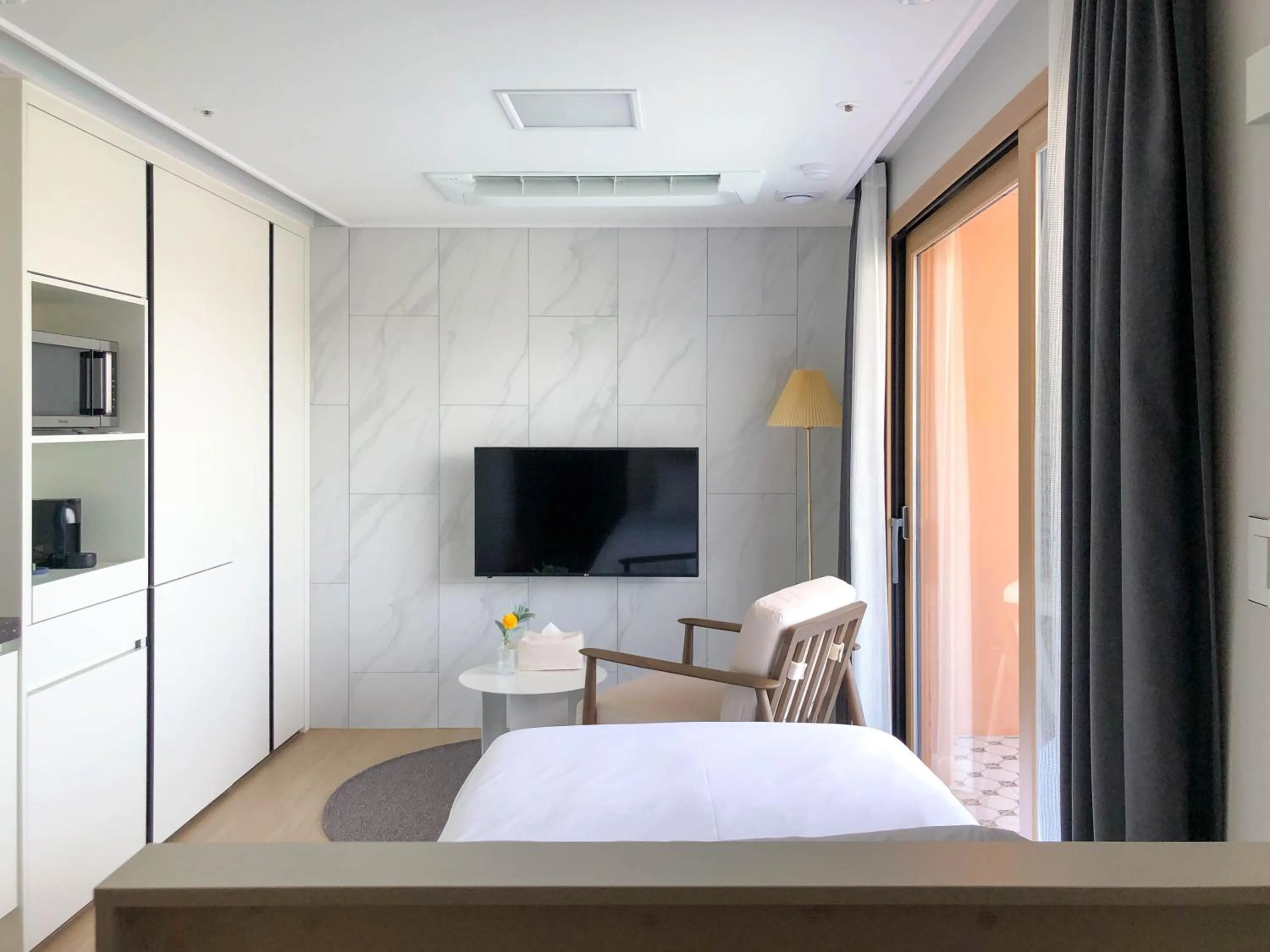 Bed in Urbanstay Jeju Airport