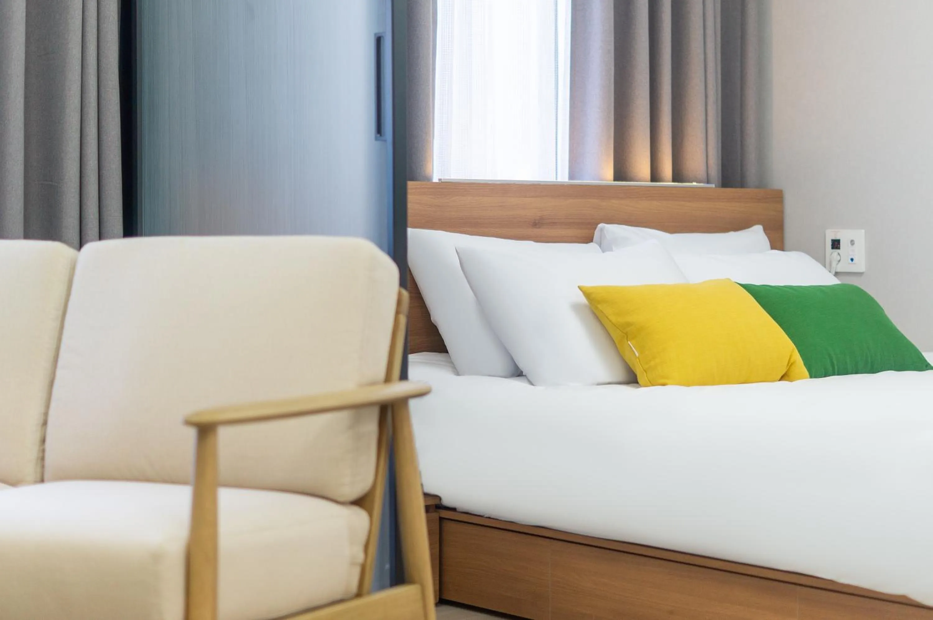 Bed in Urbanstay Jeju Airport