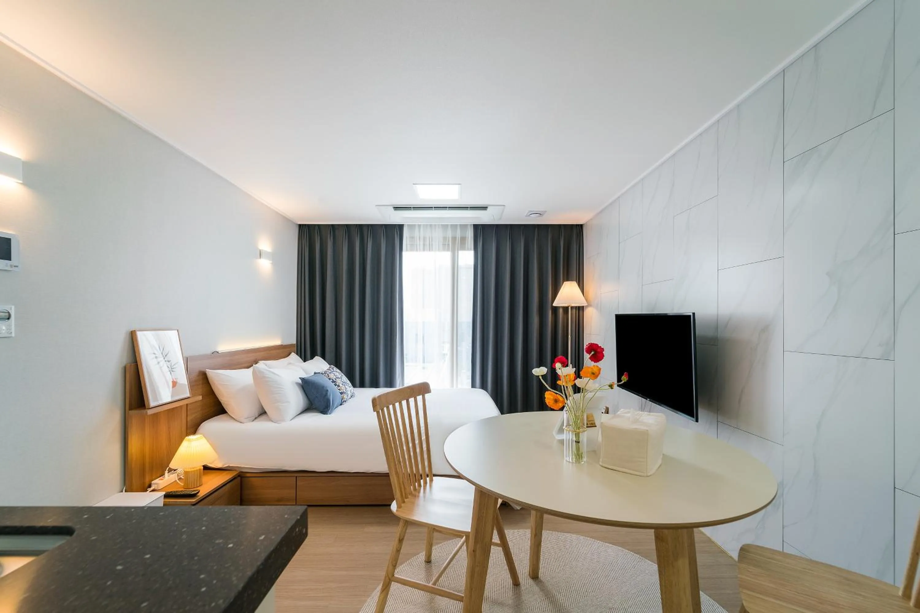 Bed in Urbanstay Jeju Airport