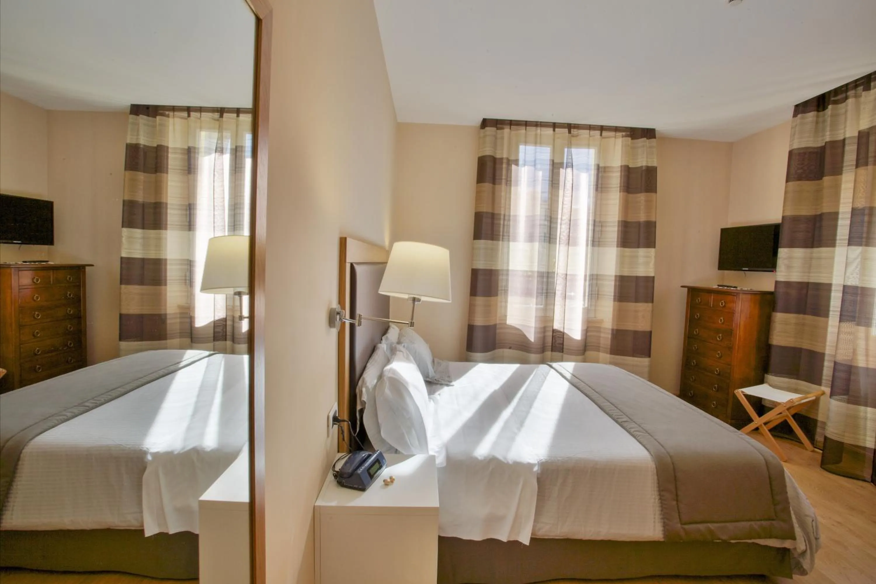 Bed in Relais Le Felci Executive Suite Spa