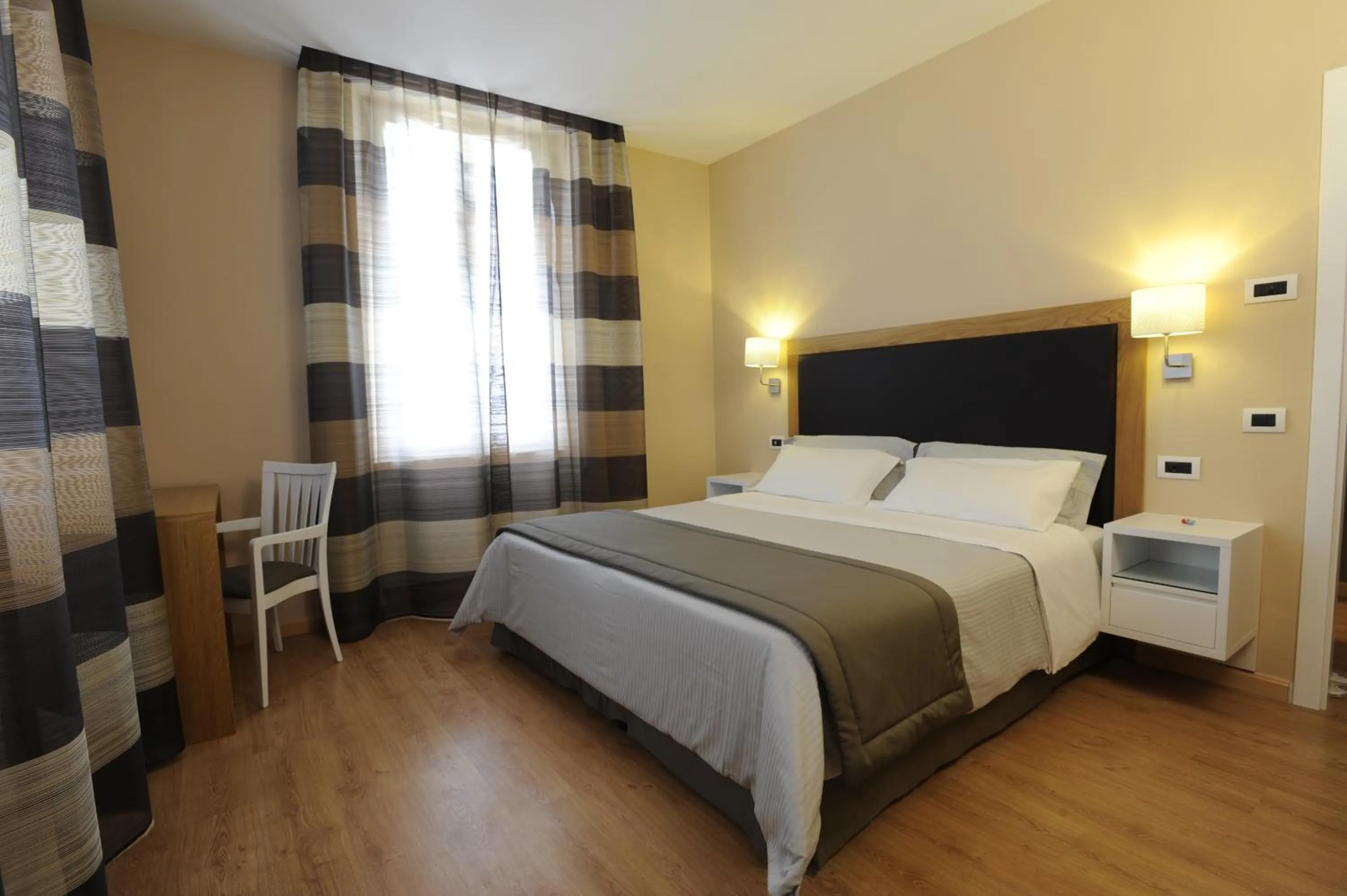 Bed in Relais Le Felci Executive Suite Spa