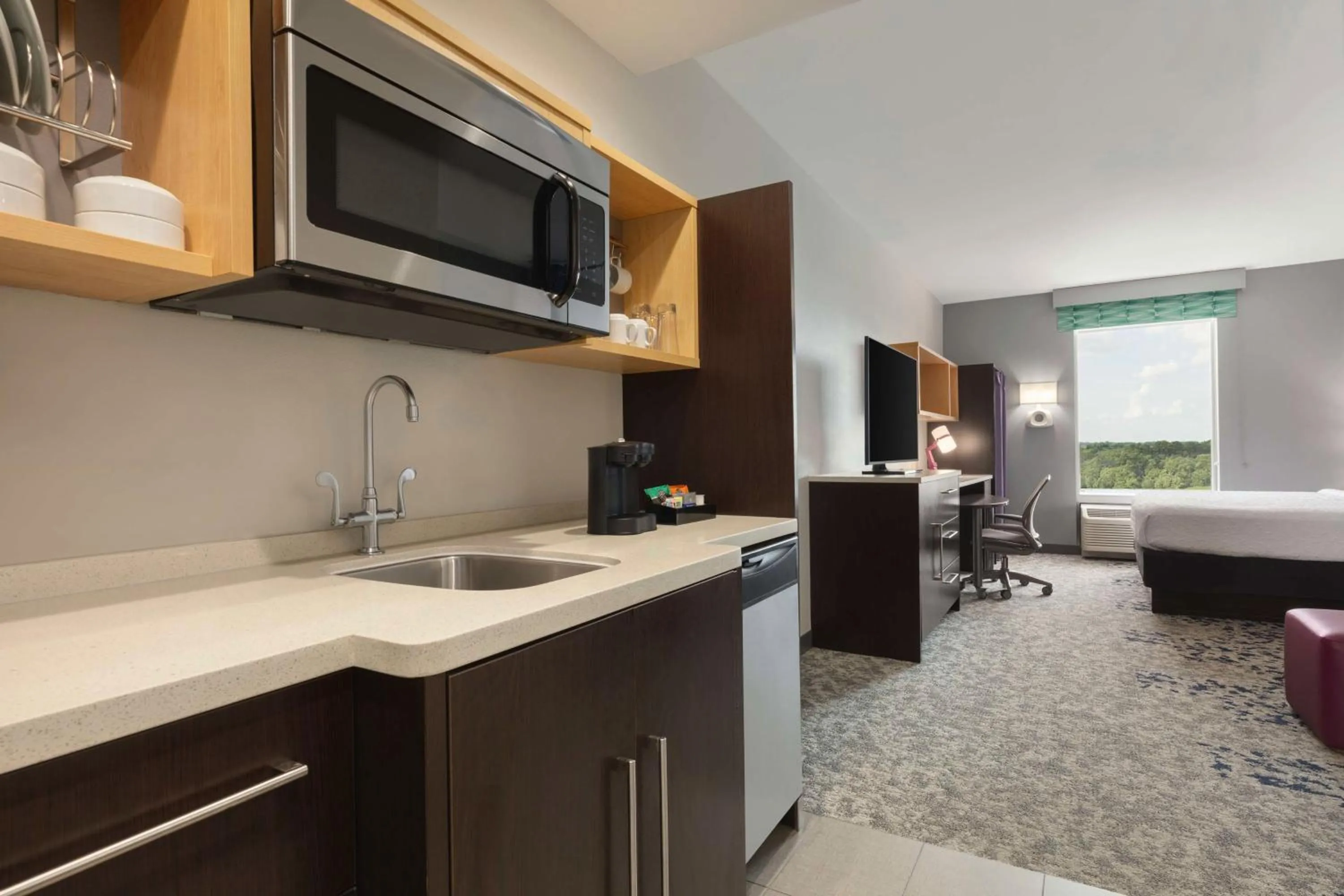 Kitchen or kitchenette, Bed in Home2Suites by Hilton Florence