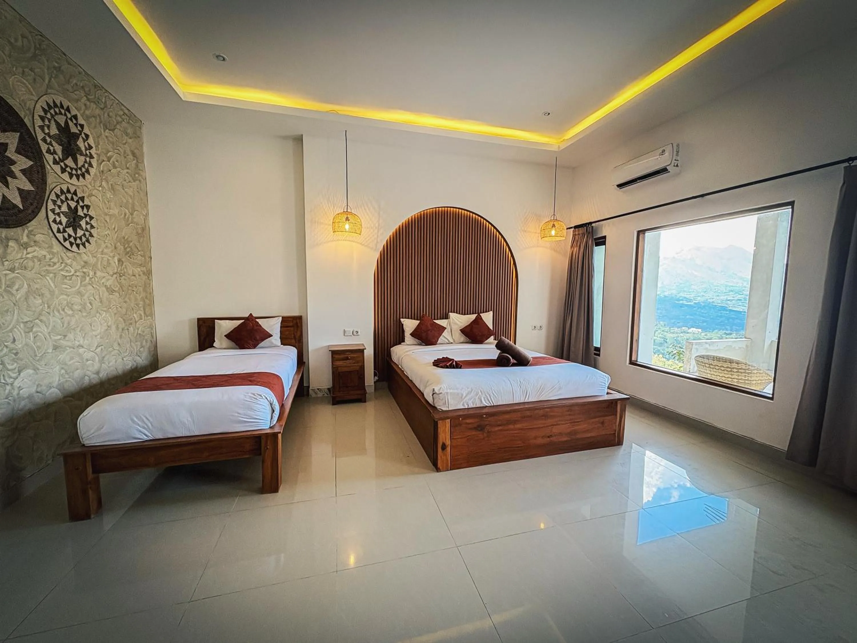 Bed in Caldera Hotel & Restaurant