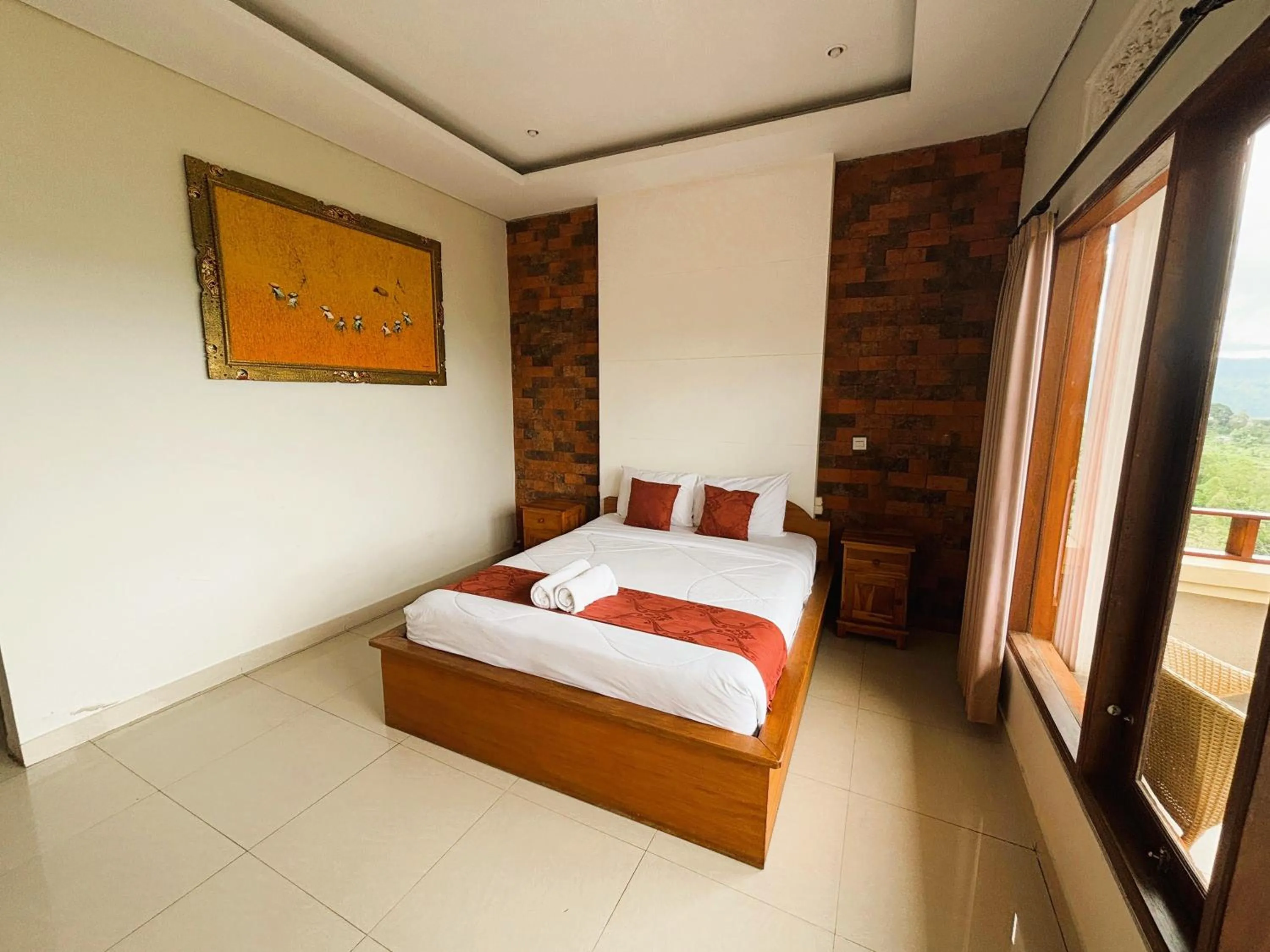 Bed in Caldera Hotel & Restaurant